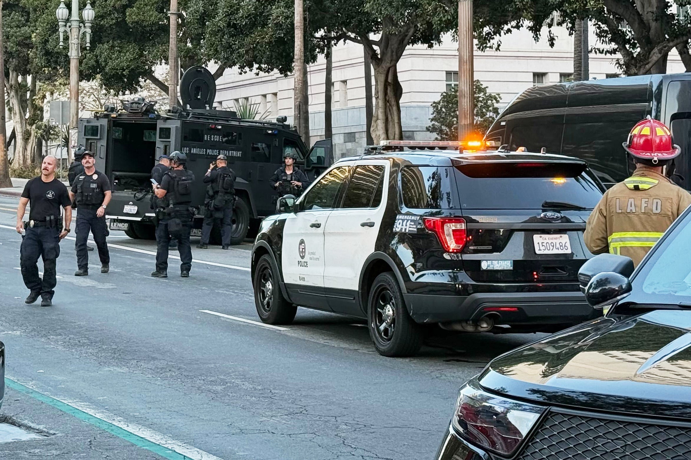 Officers arrested the driver, an adult male, about two hours after he drove his car onto the steps of the Los Angeles City Hall