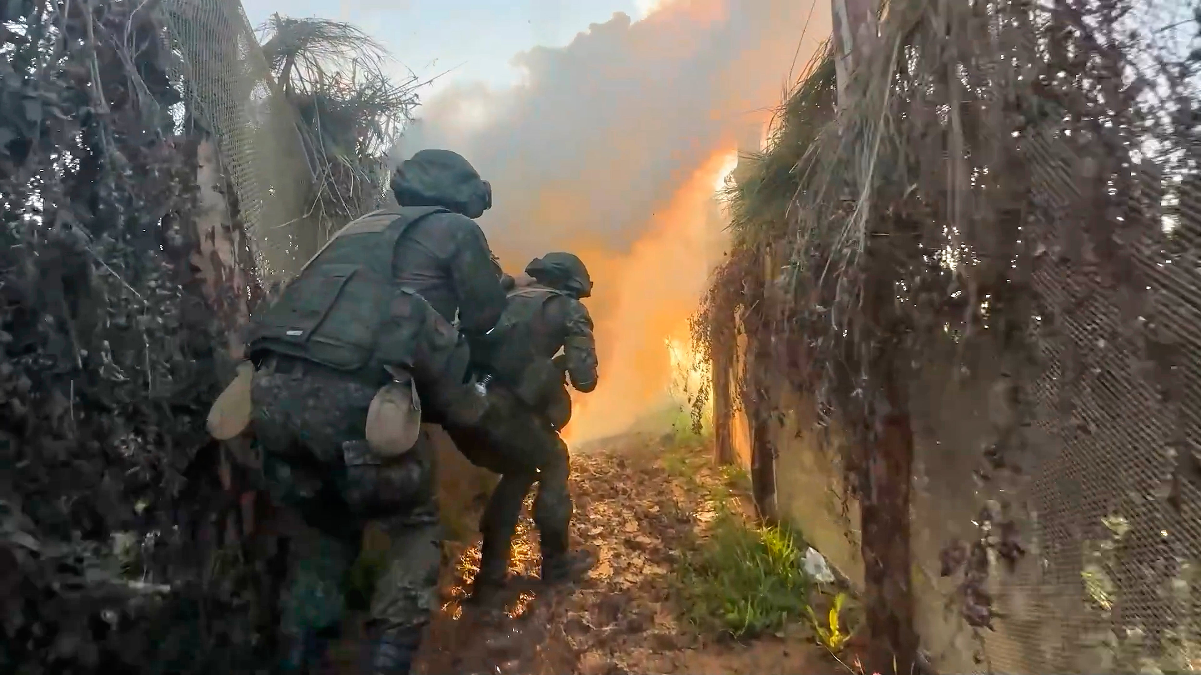 Russian servicemen attend a practice for sabotage operations behind enemy lines at a training ground on an undisclosed location