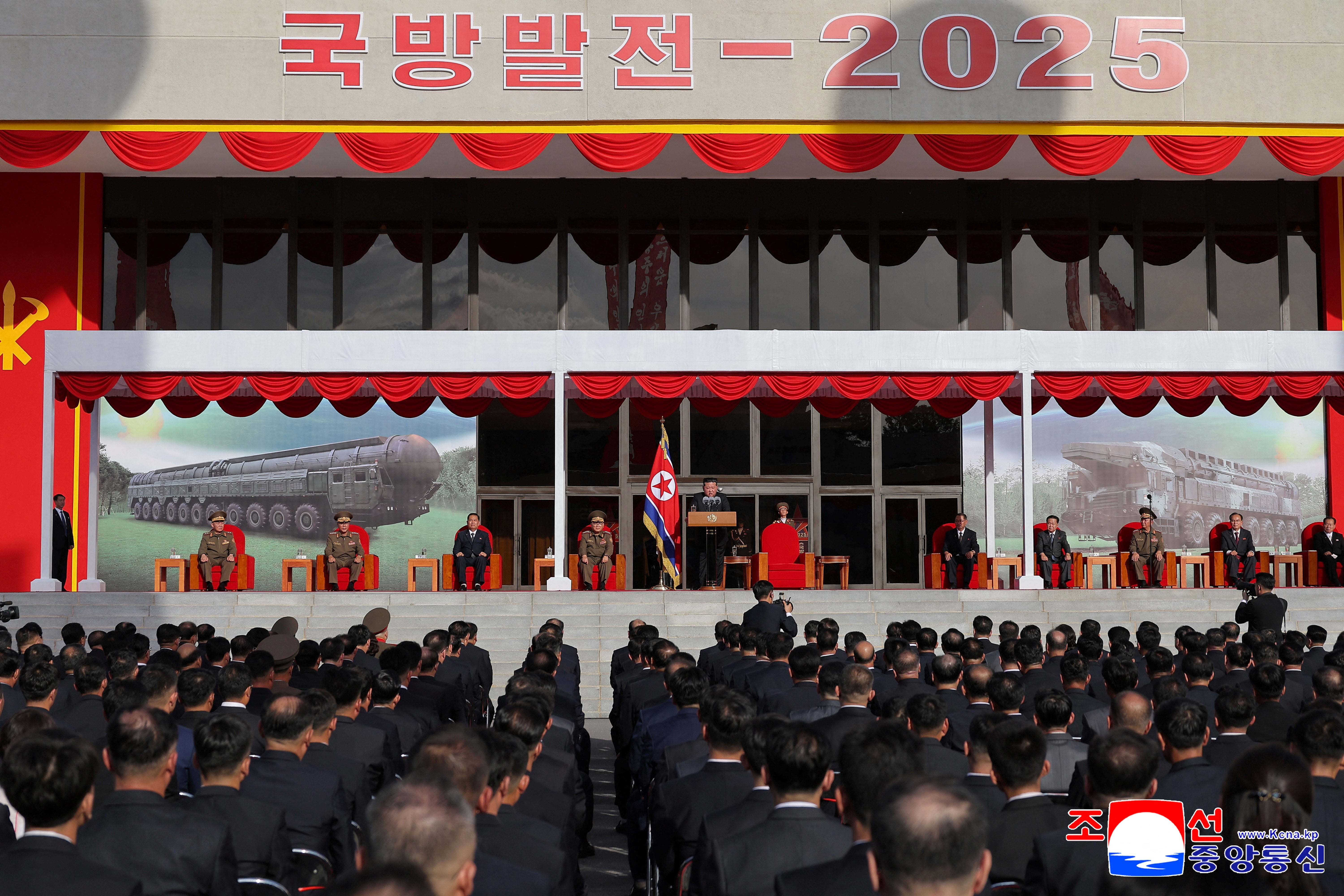North Korean leader Kim Jong Un speaks at an exhibition event ahead of the 80th founding anniversary of the Workers' Party in Pyongyang