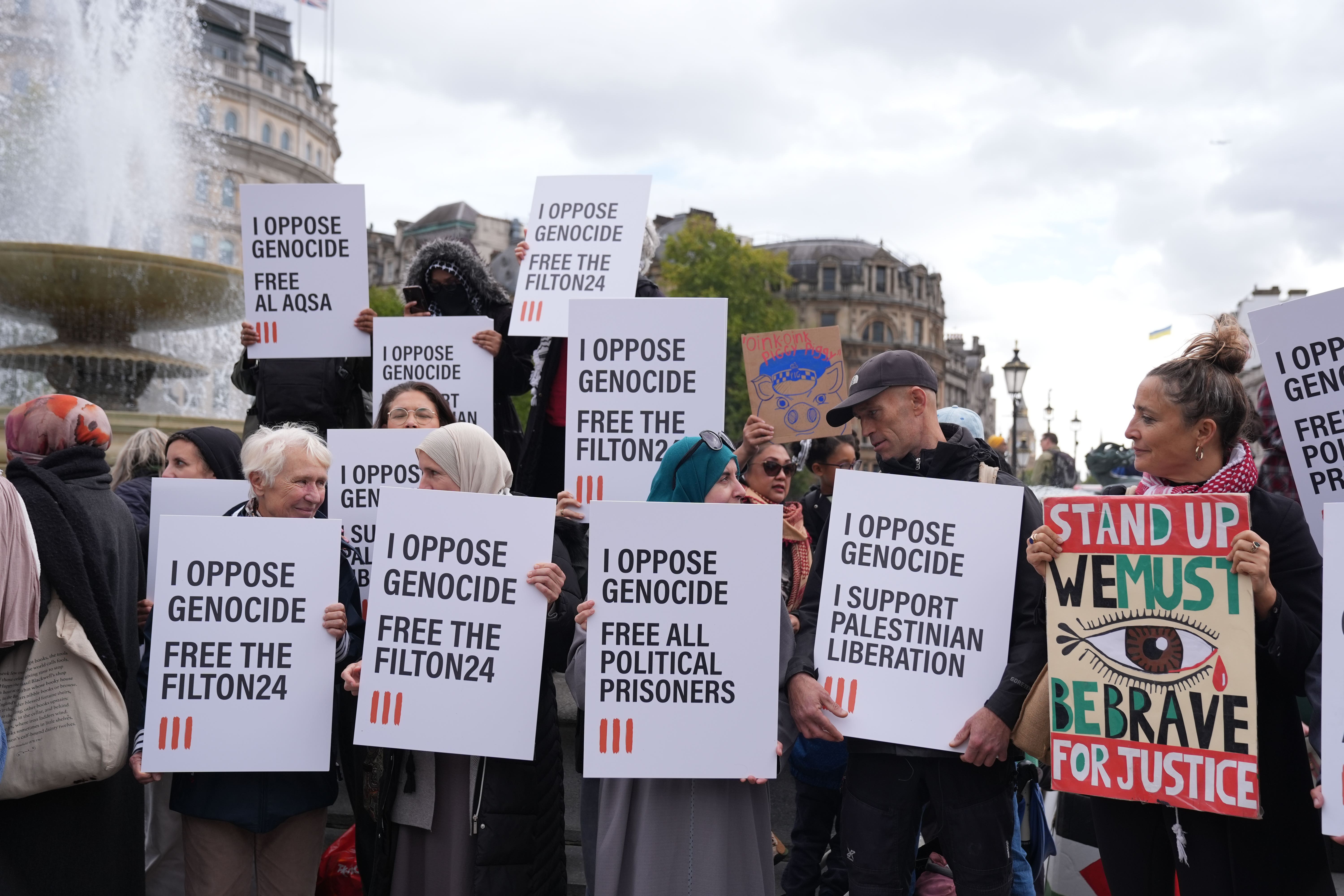 Protesters taking part in a demonstration organised by Defend our Juries (Maja Smiejkowska/PA)