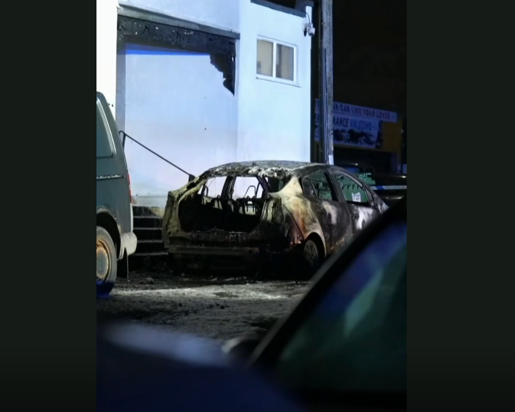 A car was destroyed in the attack on the mosque, which is being treated as a hate crime