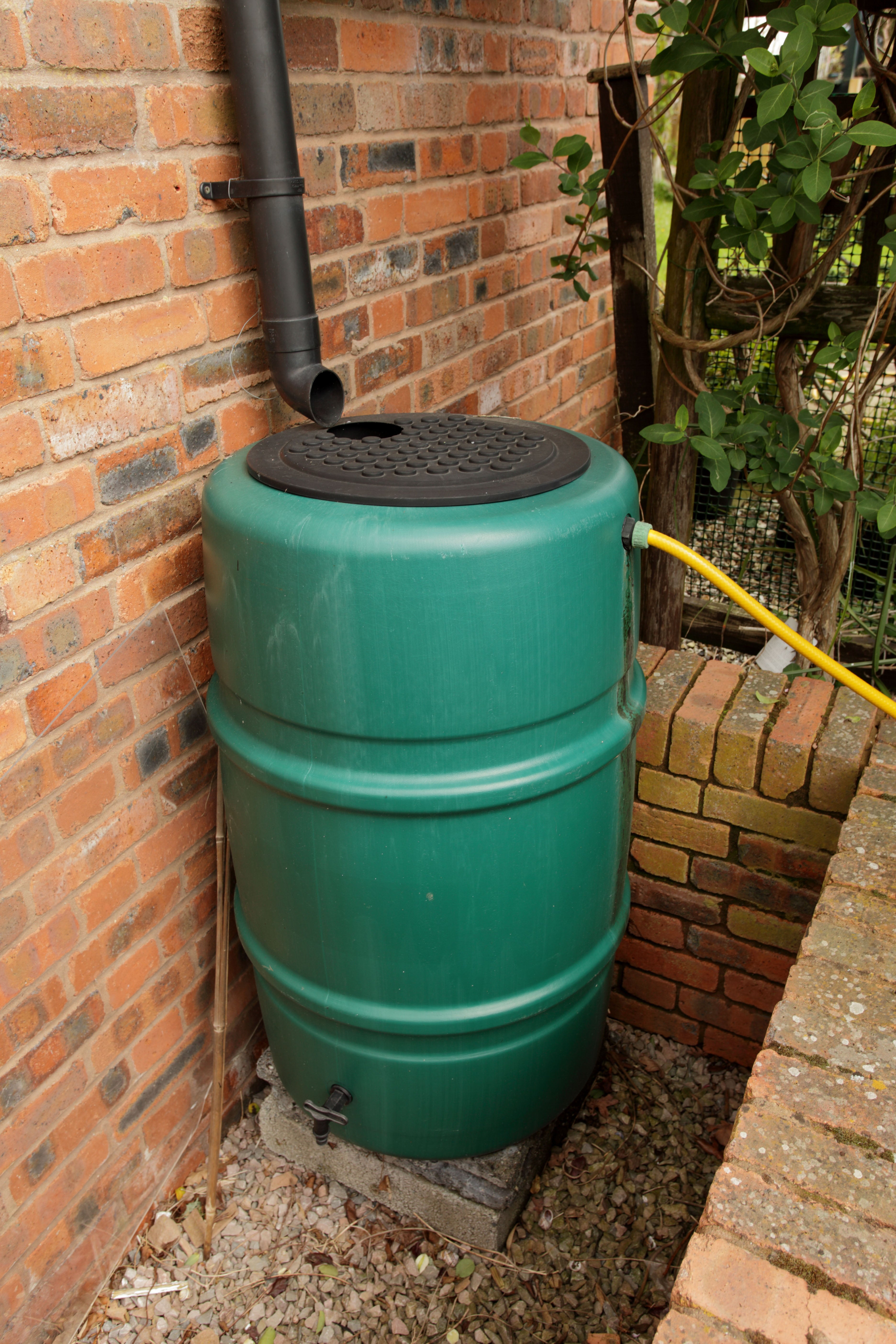 Rainwater being collected in water butt (Alamy/PA)