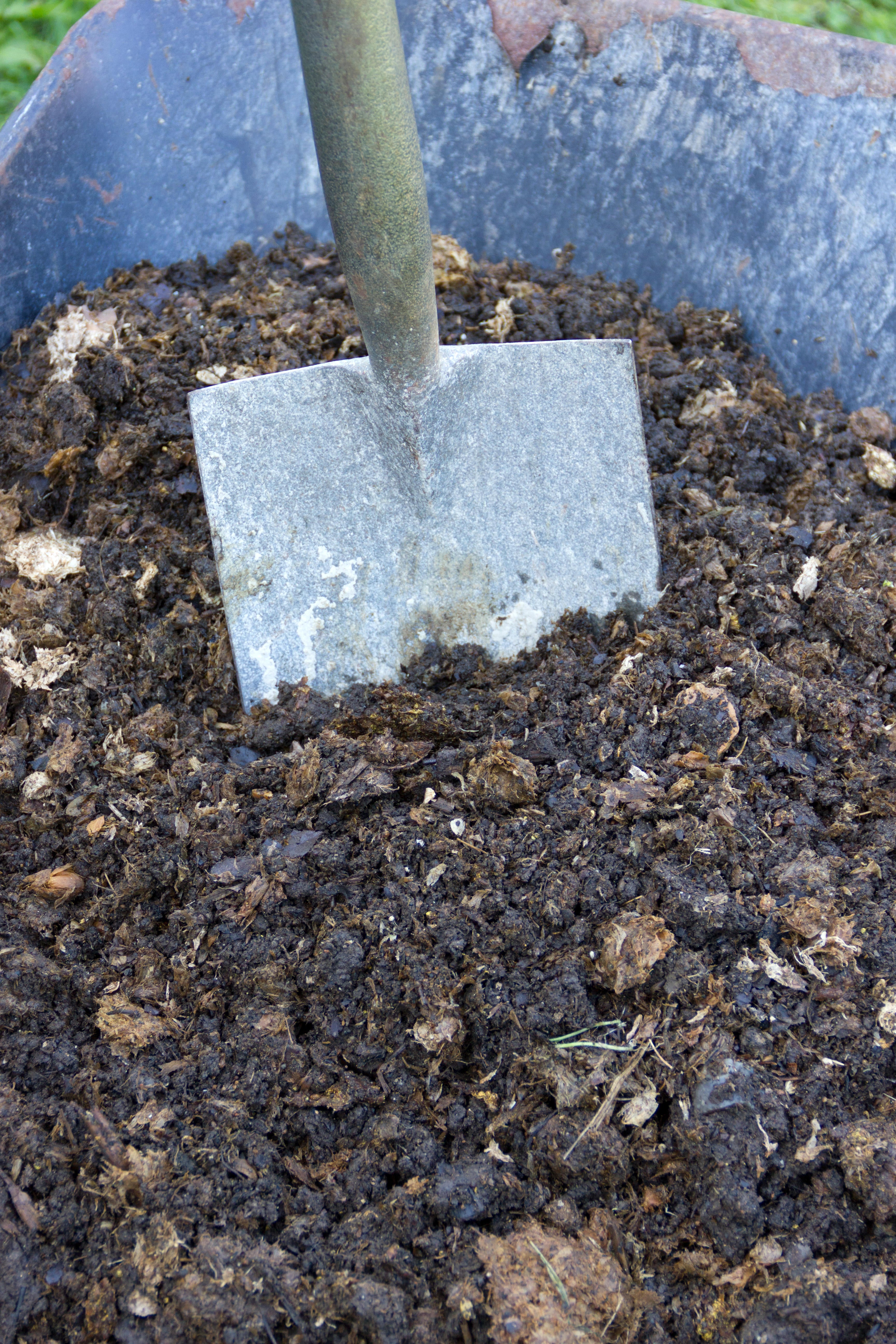 Home made compost in a wheelbarrow (Alamy/PA)