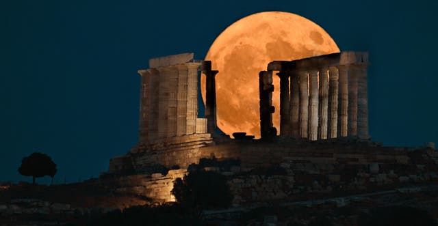 <p>Supermoon over The Temple of Poseidon at Sounion on the Athenian coast of Greece</p>