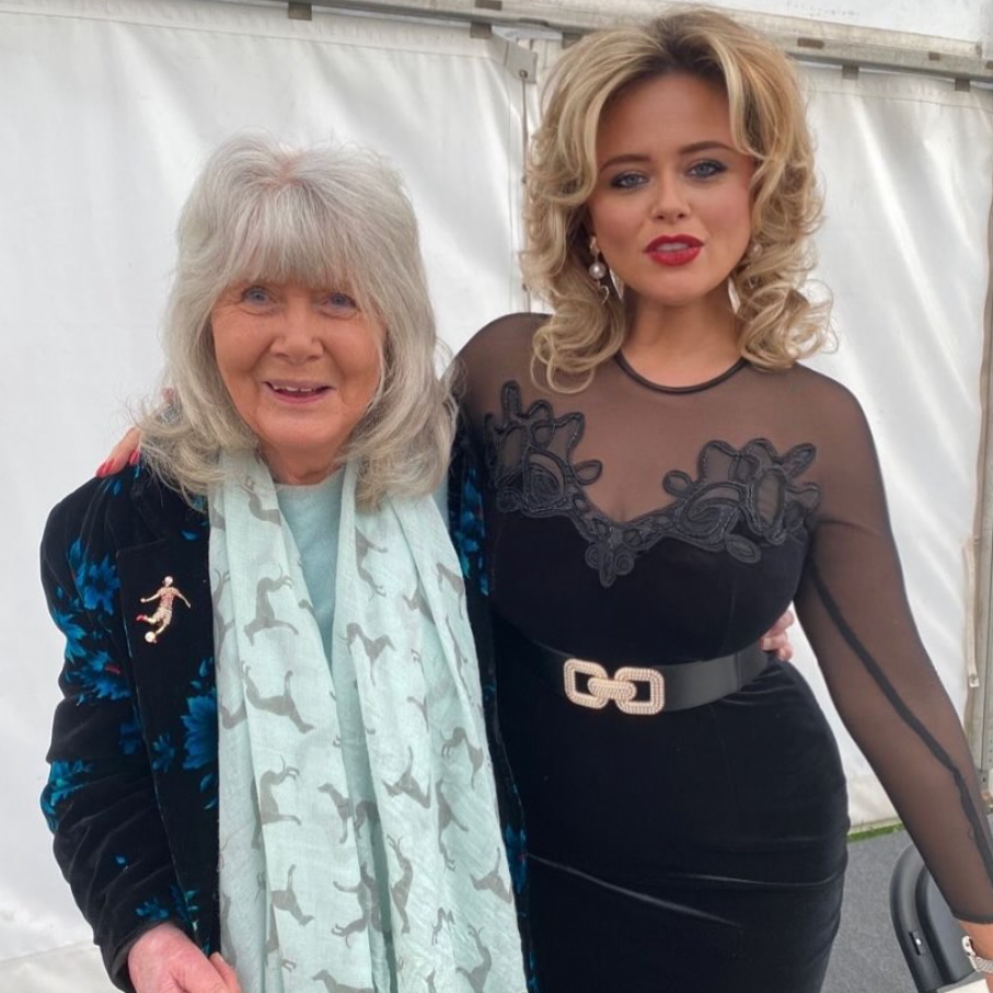 The writer poses with Emily Atack