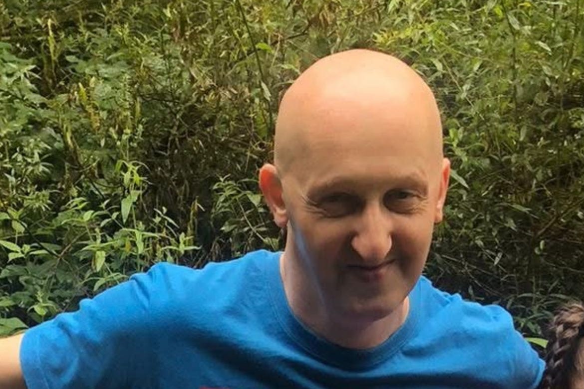 Adrian Daulby was shot by a police officer during the attack, an inquest has heard