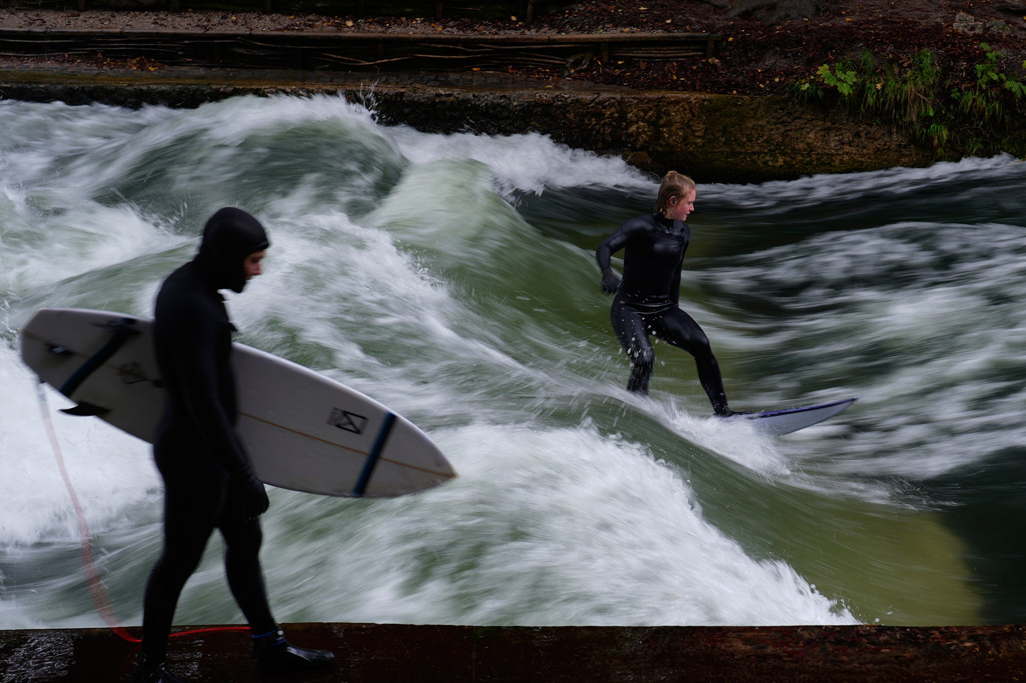 The Eisbach, or 'icy creek', a man-made wave on the Isar River, has been a popular attraction for surfers in Munich since 1972