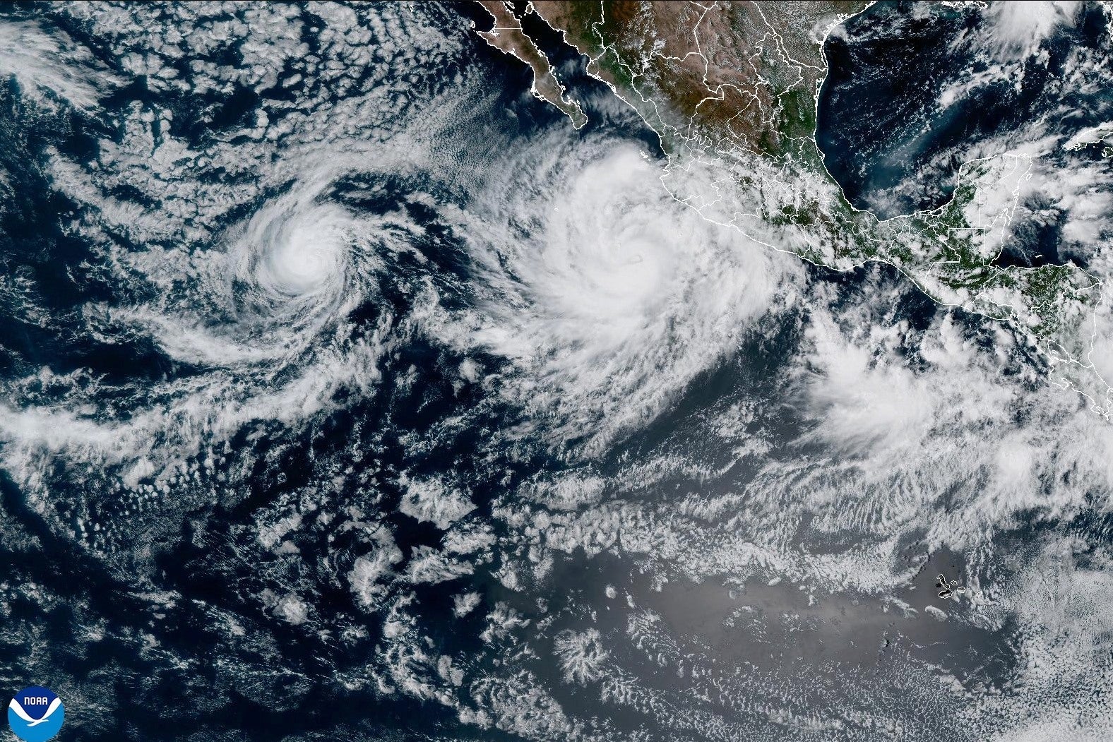 In this satellite image released by NOAA, Tropical Storm Priscilla forms in the easter Pacific off Mexico, Oct. 5, 2025. (NOAA via AP)