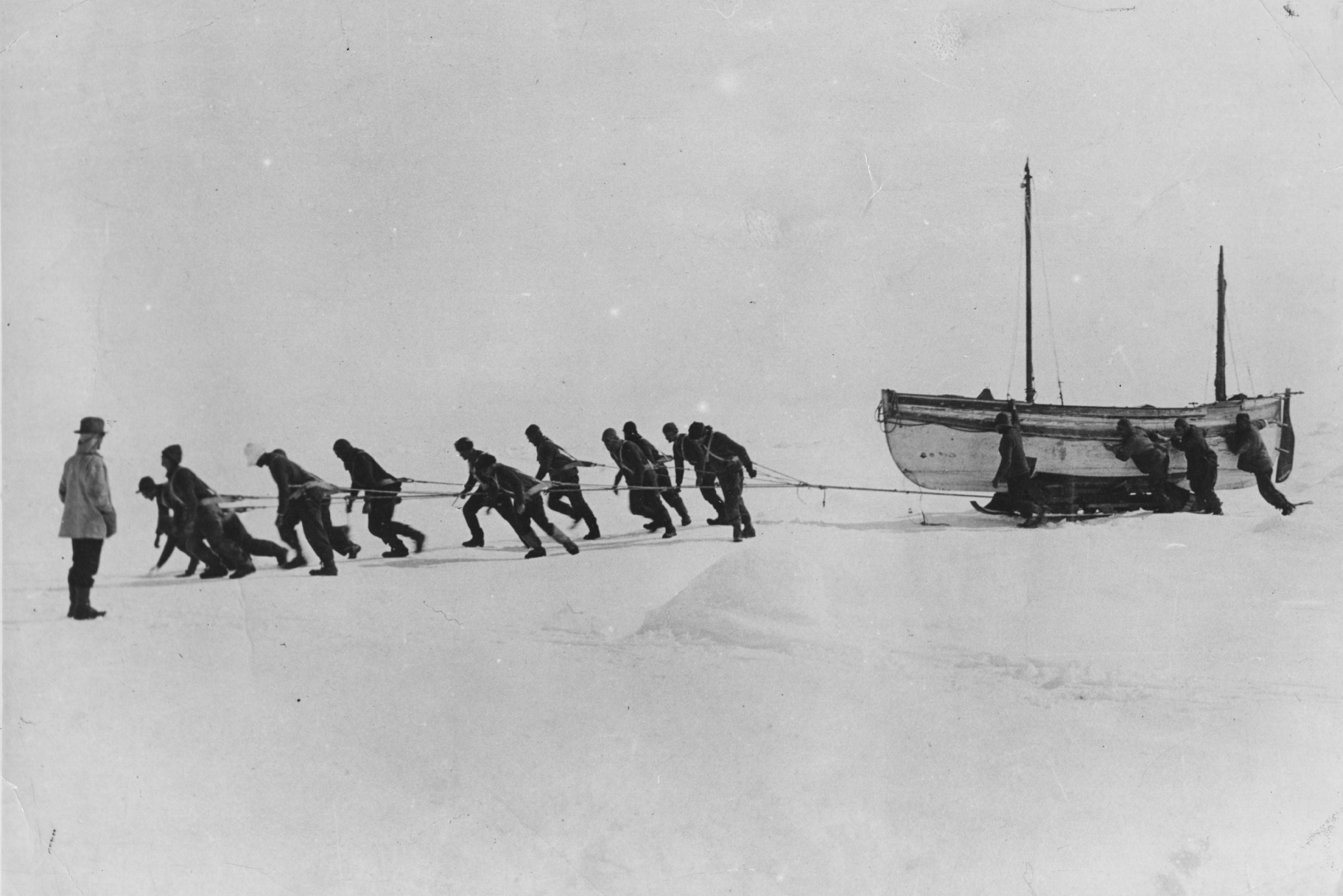 Members of the Imperial Trans-Antarctic Expedition pull a lifeboat across Antarctic snow in 1916 after the loss of the ship HMS Endurance . Some 110 years later, we’re still learning more about what led to the vessel’s sinking.