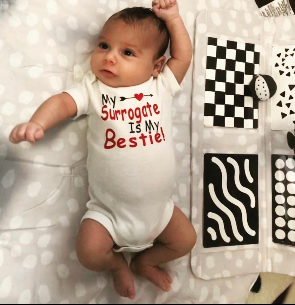 One of the babies carried by Ariel Taylor, in a photo sent by the parents and shared with permission. Like most surrogates, Taylor stays in contact with the children she has carried, who range in age from 8 to 2 years old, and they will often exchange photos and family updates and occasionally meet for holidays