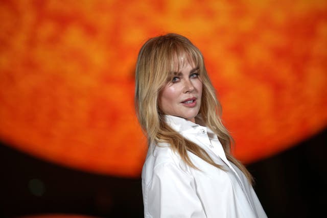 Nicole Kidman poses for photographers upon arrival at Chanel Spring/Summer 2026 (Christophe Ena/AP)