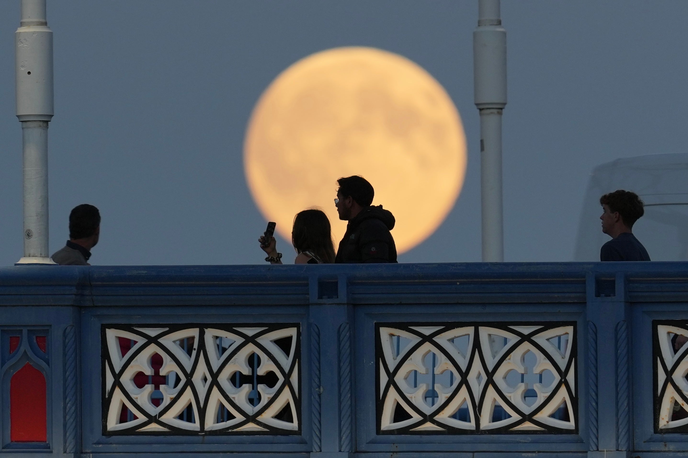 The Harvest supermoon rises over Tower Bridge in London, Monday, 6 October, 2025
