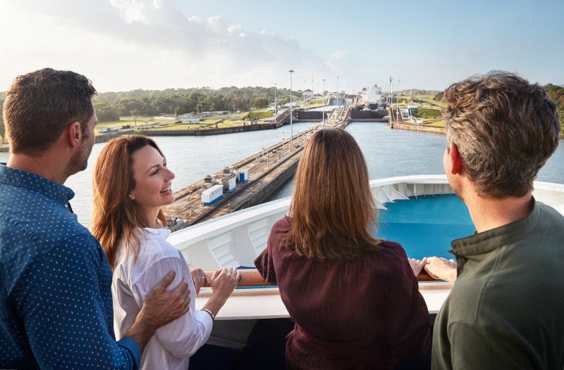 Enjoy the views as you pass through the Panama Canal on a cruise ship