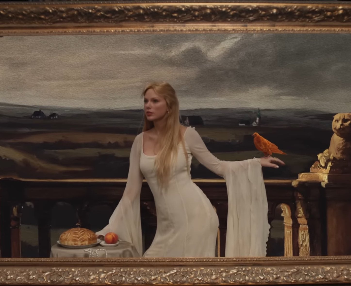 On a table in the painting lie a string of pearls and a peach, likely a reference to the title track ‘The Life of a Showgirl’