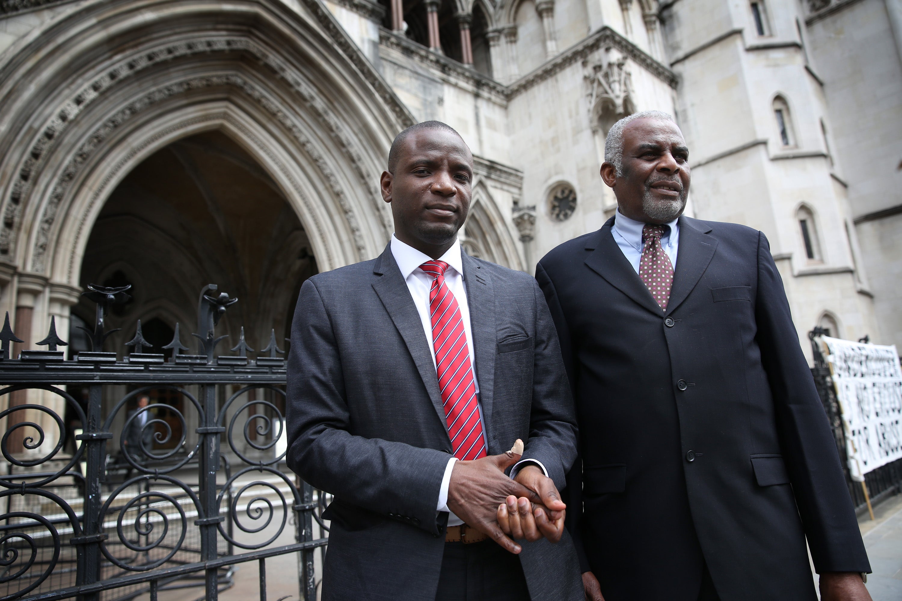 Duwayne Brooks (left) and Neville Lawrence outside the High Court in London in 2015