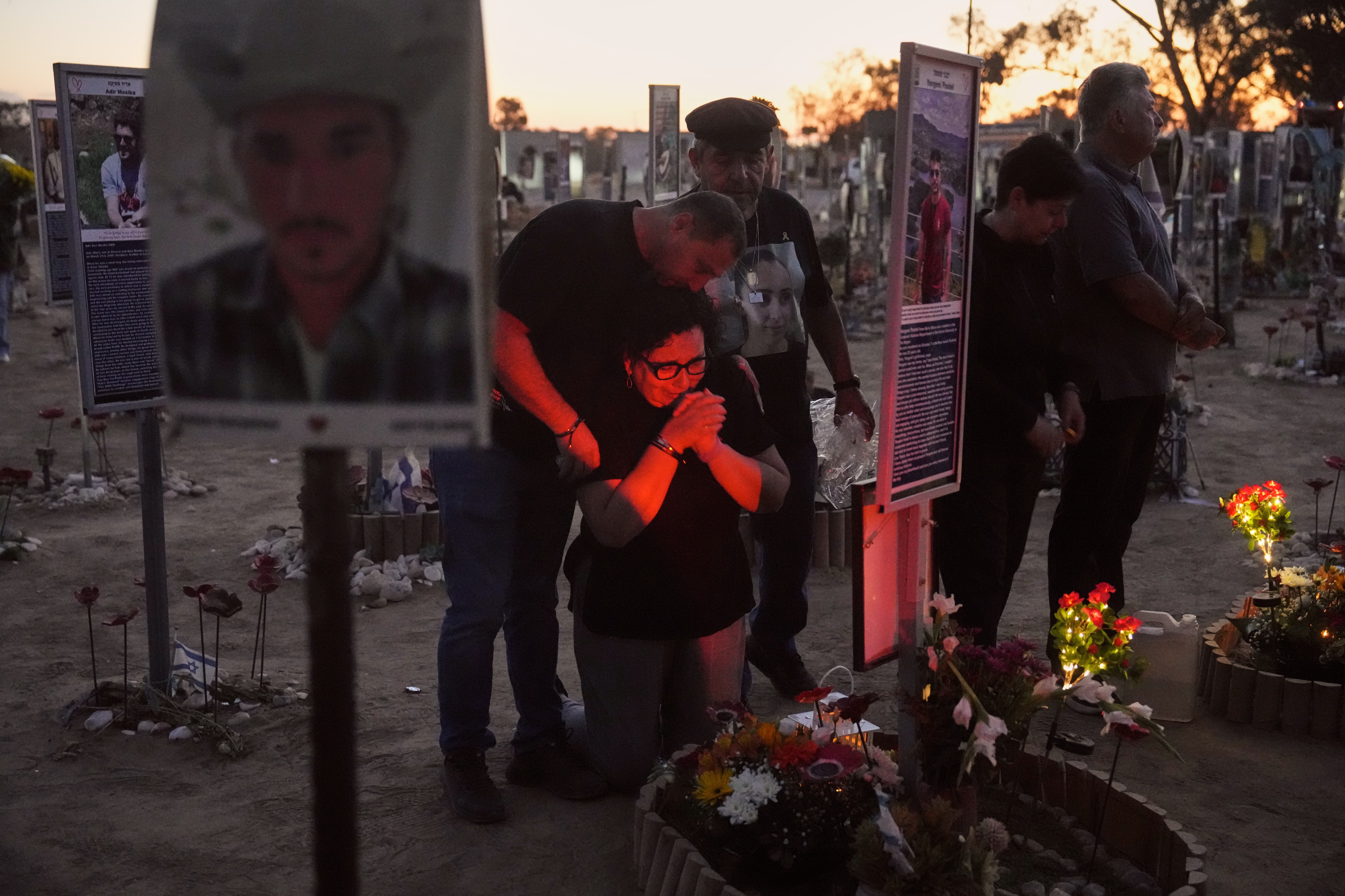 People visit the site of the Nova music festival on Tuesday to grieve for those killed and abducted two years ago