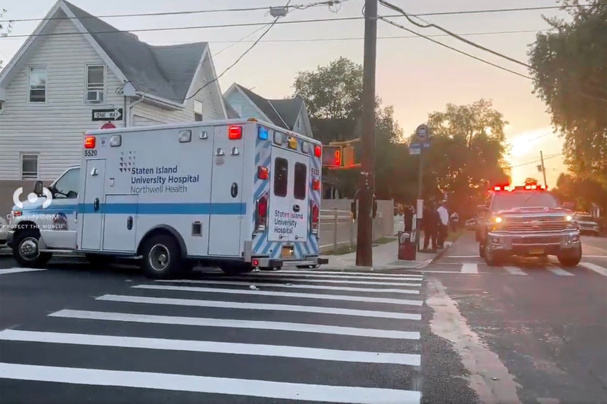 Teen suspect seen in bloodied perp walk after he allegedly decapitated his stepfather