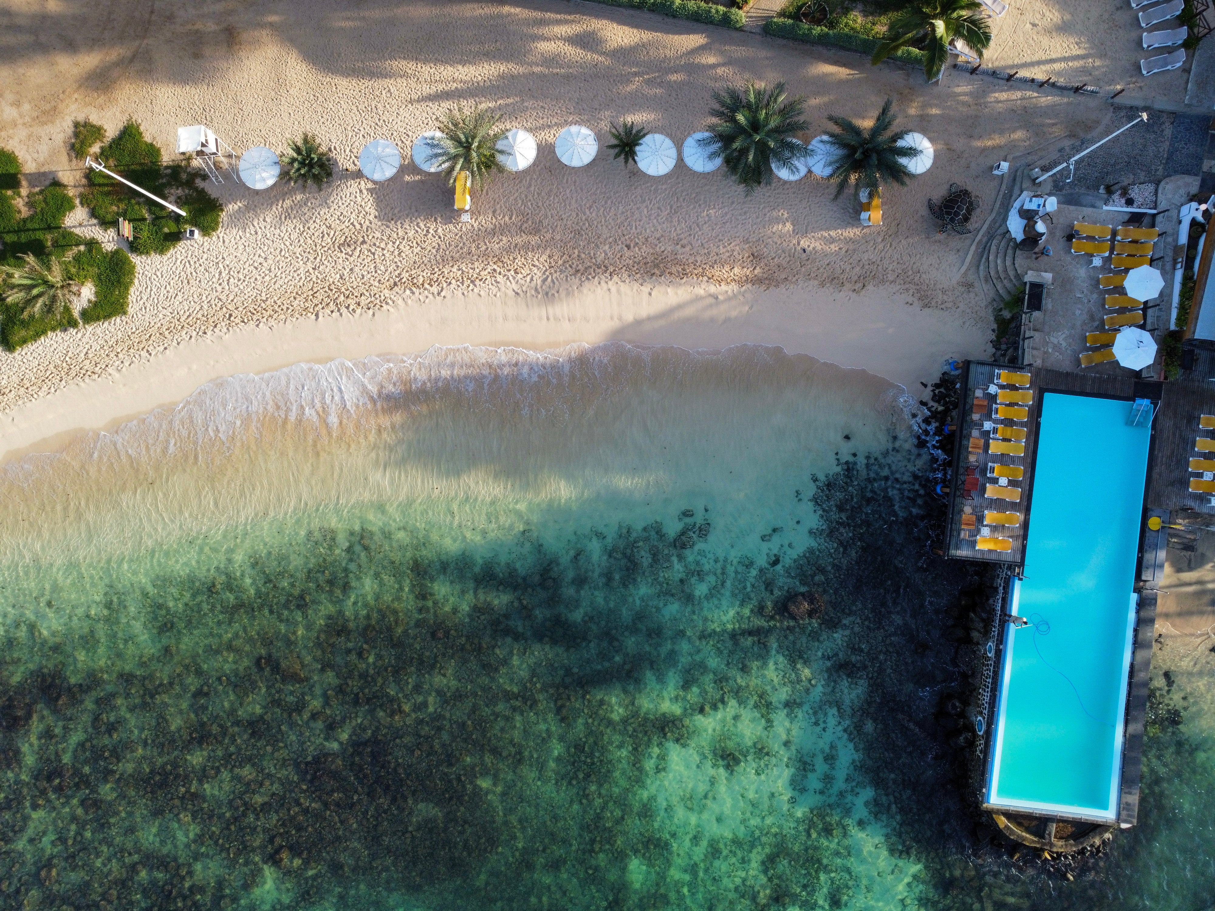 Odjo D’Agua’s infinity pool juts out over the sea