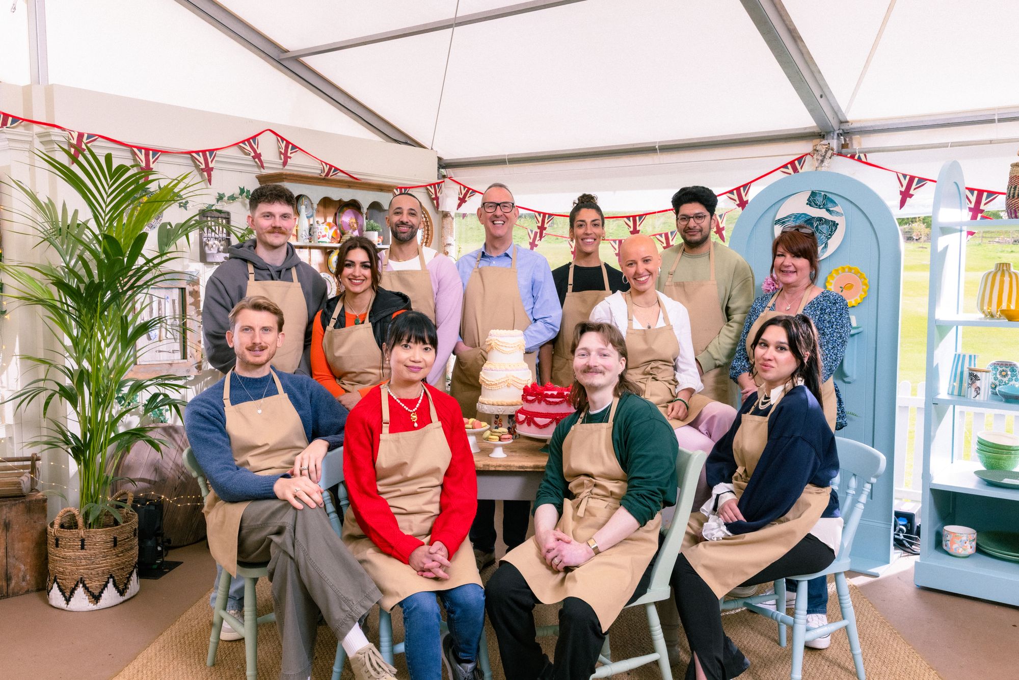 The Great British Bake Off Series 16 contestants (back row, left to right) Toby, Nadia, Aaron, Leighton, Jessika, Jasmine, Hassan and Lesley; and (front row, left to right) Tom, Pui Man, Iain and Nataliia