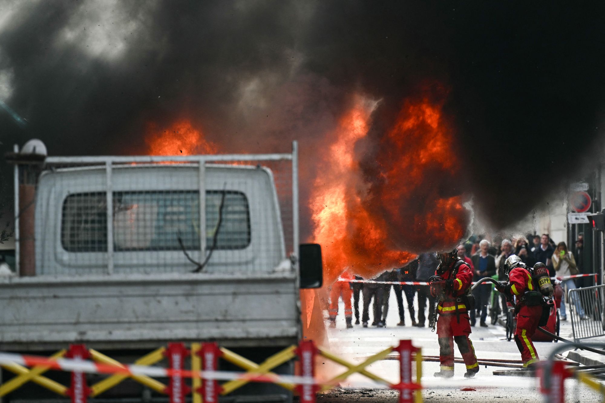 A van on fire near the French Prime Minister’s Office in Paris