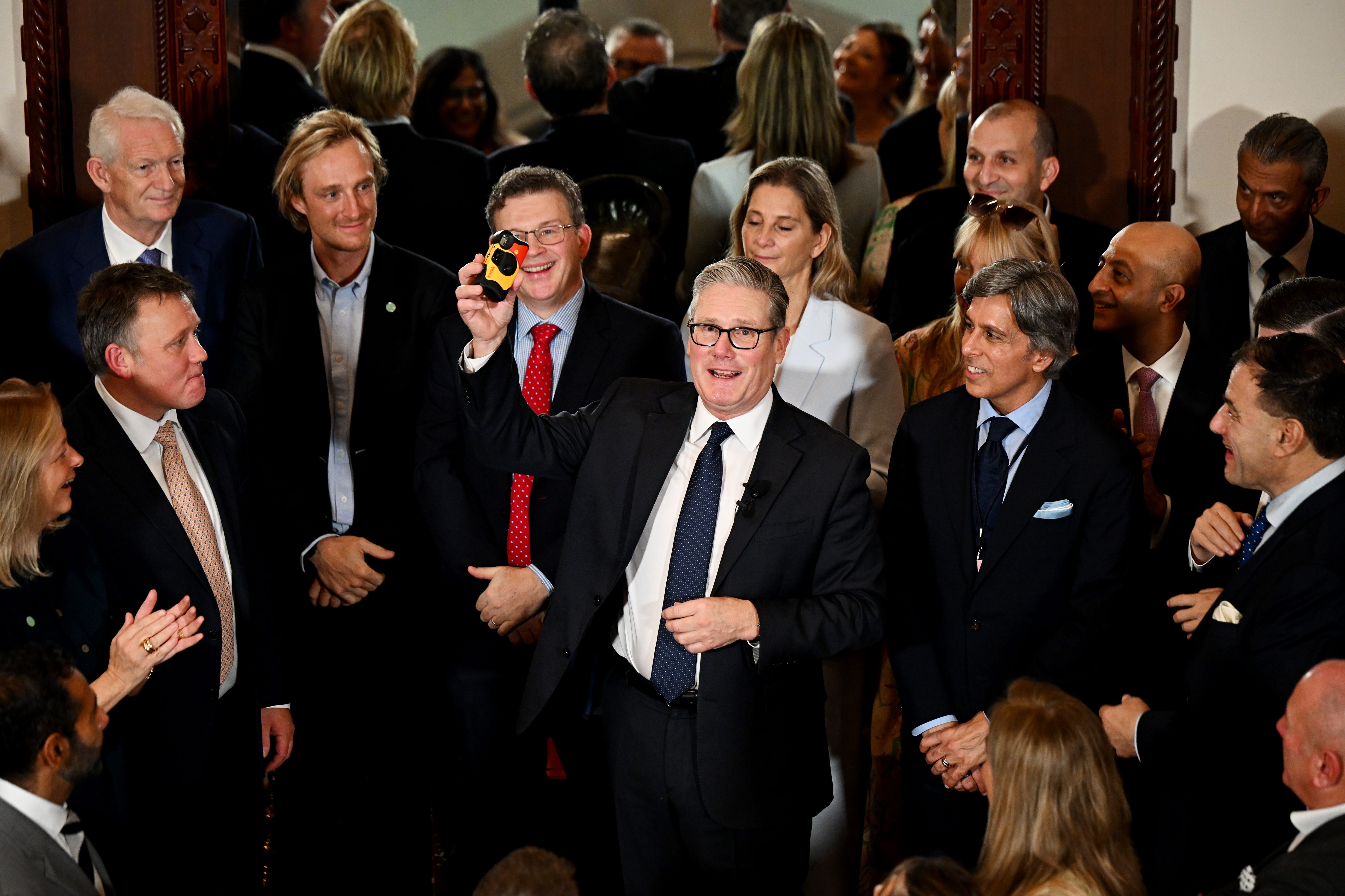 Prime Minister Sir Keir Starmer takes a picture while speaking in Mumbai to the travelling delegation of business and cultural leaders who joined him on his visit to India (Leon Neal/PA)