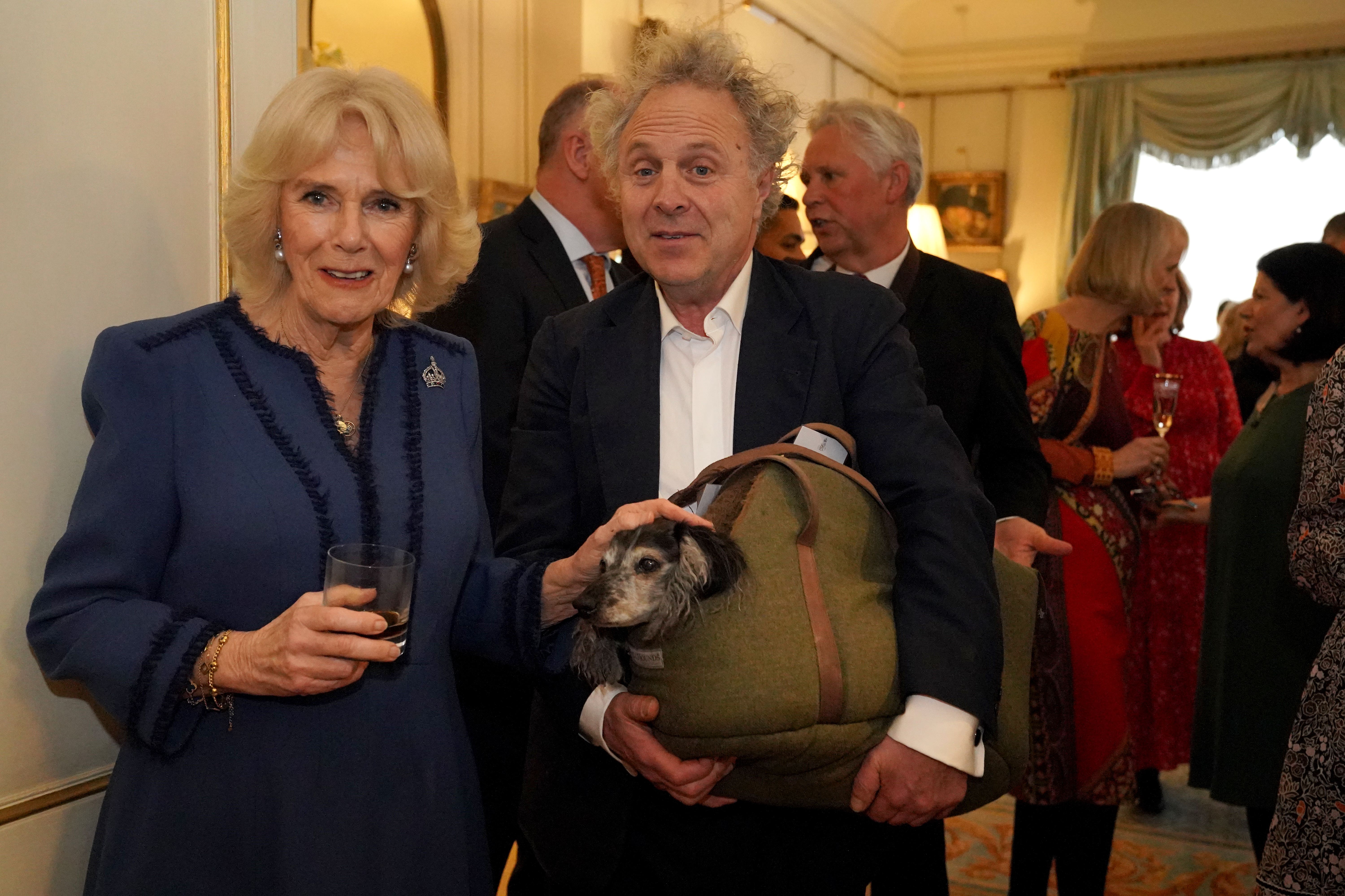 Charlie Mackesy, pictured with Queen Camilla