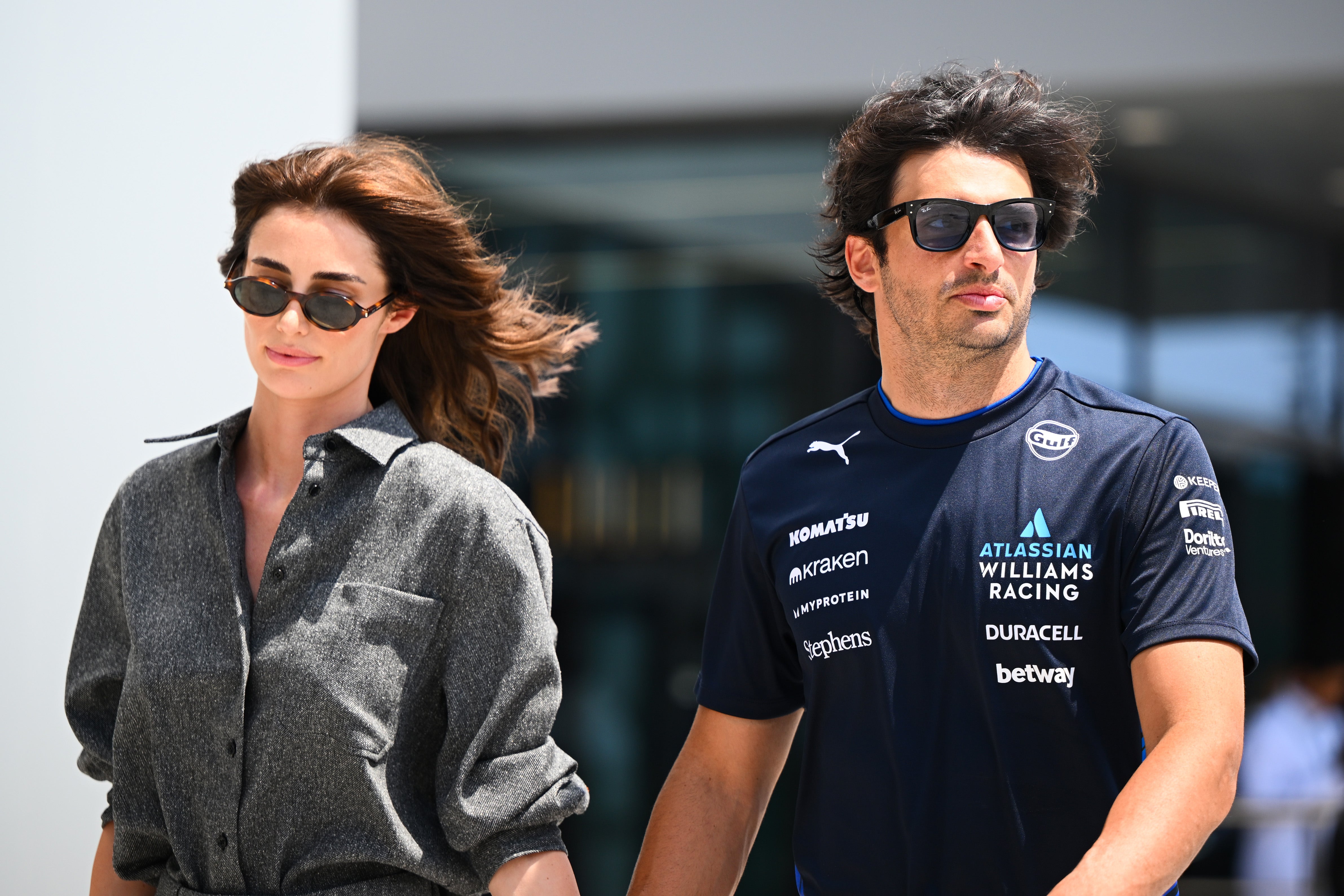 Carlos Sainz with girlfriend Rebecca Donaldson in the F1 paddock