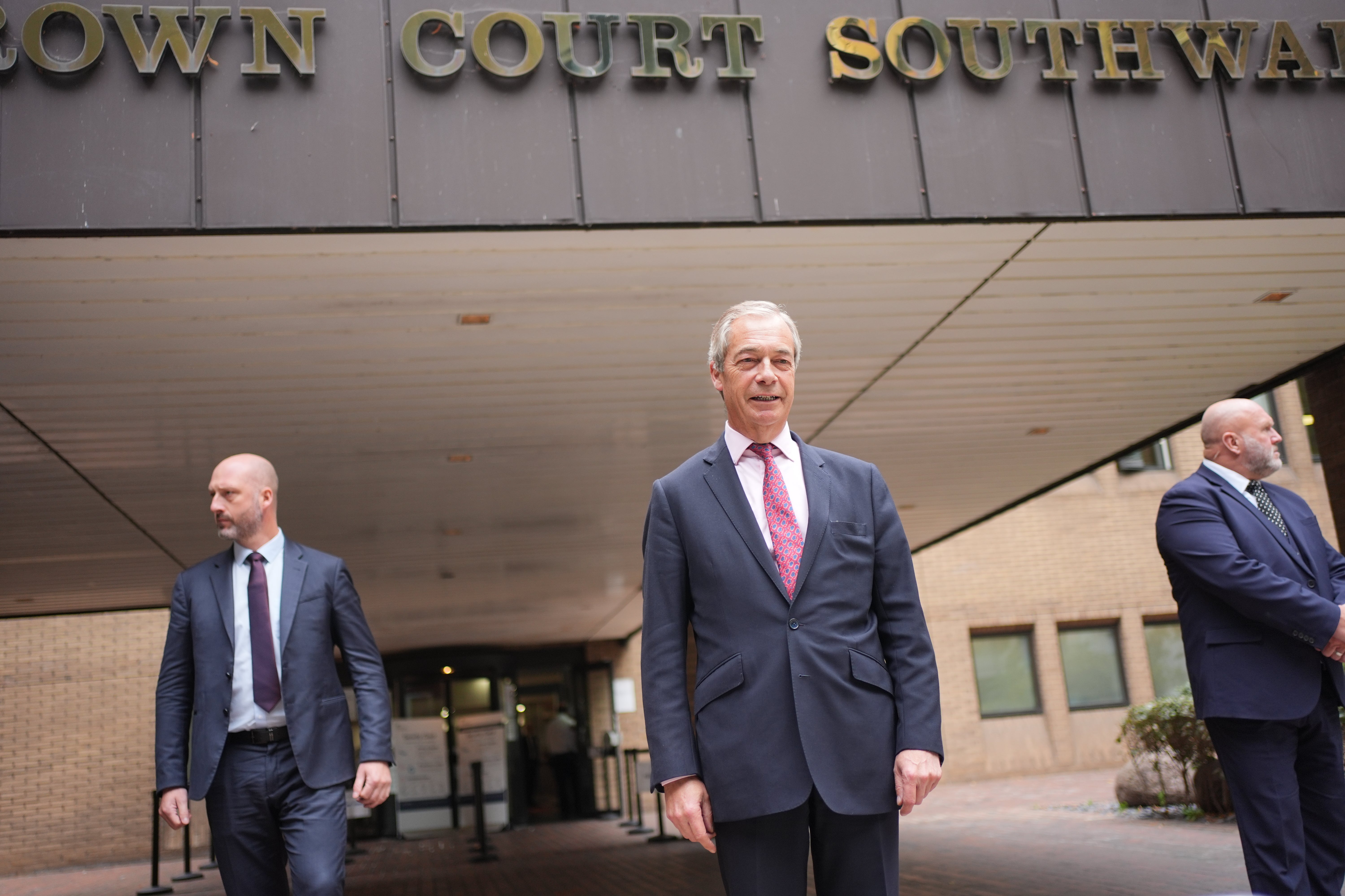 Reform UK leader Nigel Farage outside Southwark Crown Court on Friday
