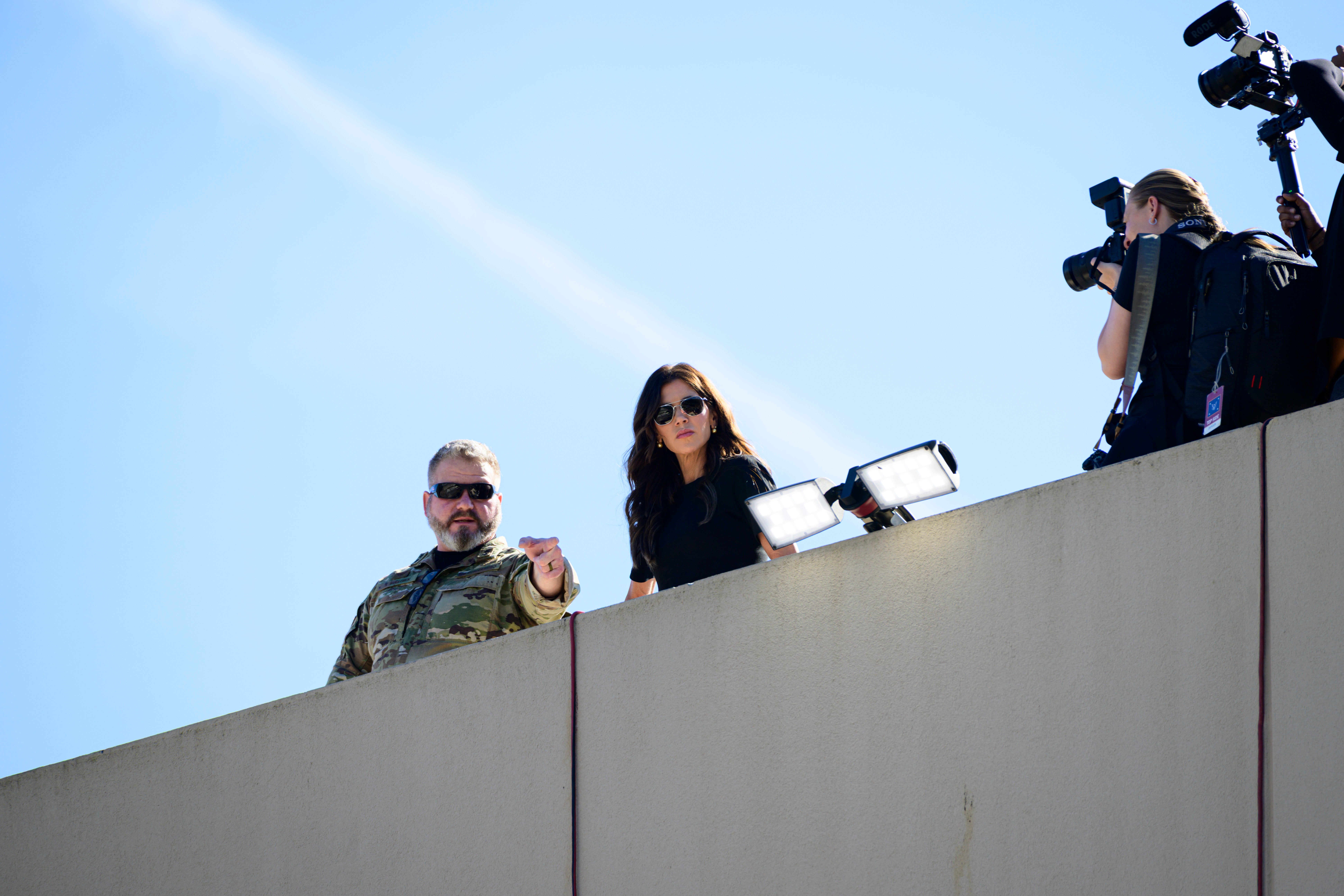 Homeland Security Secretary Kristi Noem watching a protest in Portland, Oregon, on October 7. Trump administration officials accuse members of Antifa of leading violent protests against federal buildings in Portland and Chicago