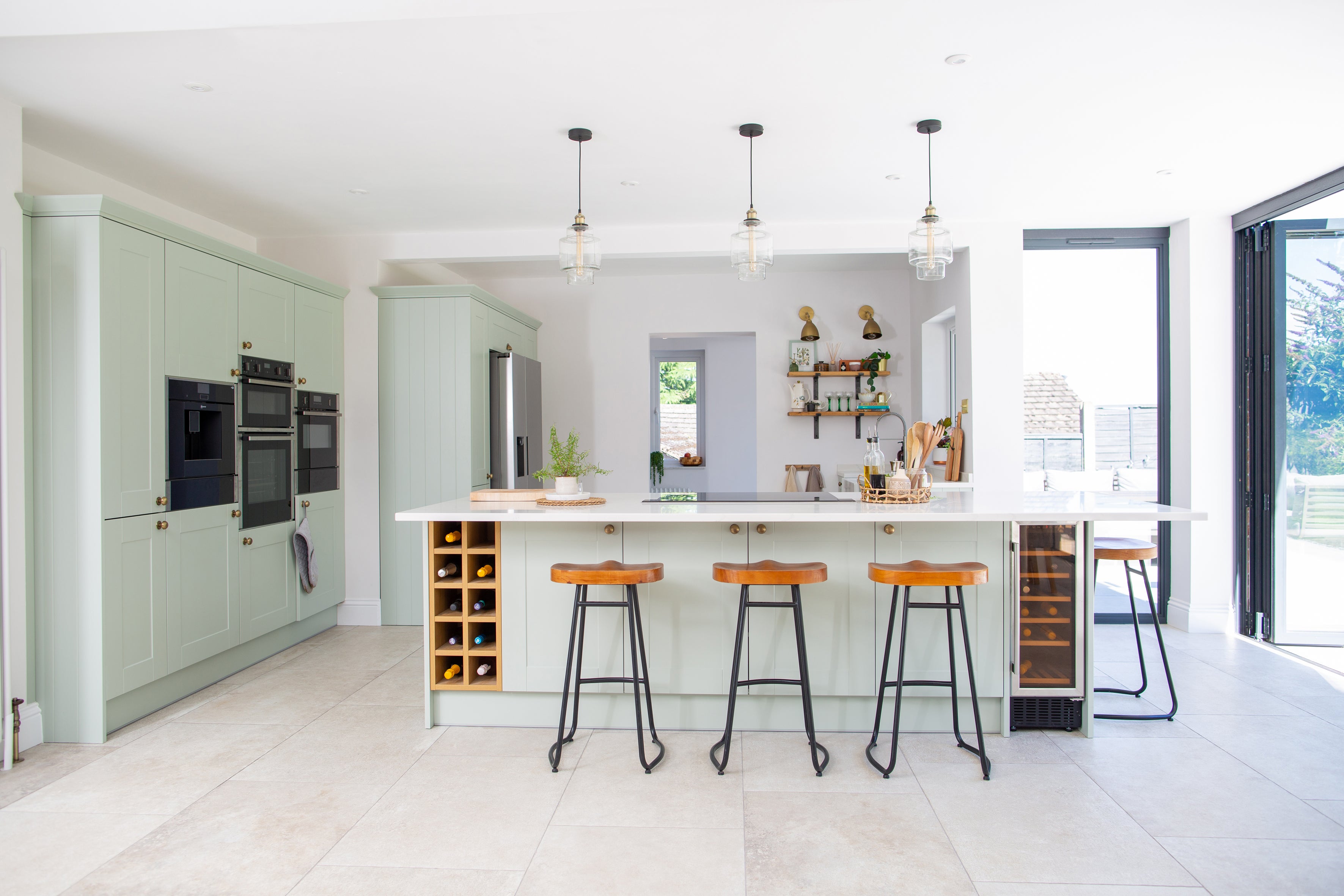 A pendant lamp over your table or counter can provide all the light you need and use less energy