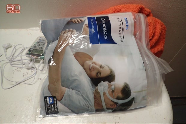 A photo of a bag containing Epstein’s CPAP machine, as well as his personal headphones. Photos of the actual mask only appear sometimes in images