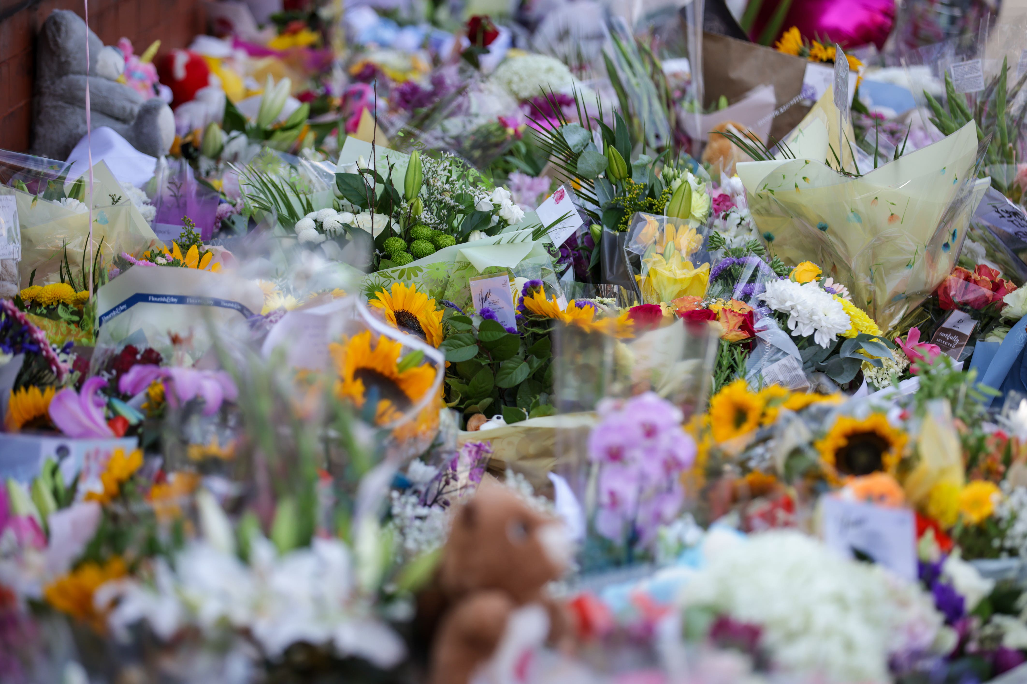 Flowers left in tribute to the victims of the Southport attack (James Speakman/PA)