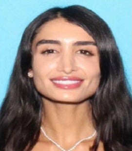 Adva Lavie, a glamorous Porsche-driving former pin-up girl, dated older men to burgle their homes, California cops say