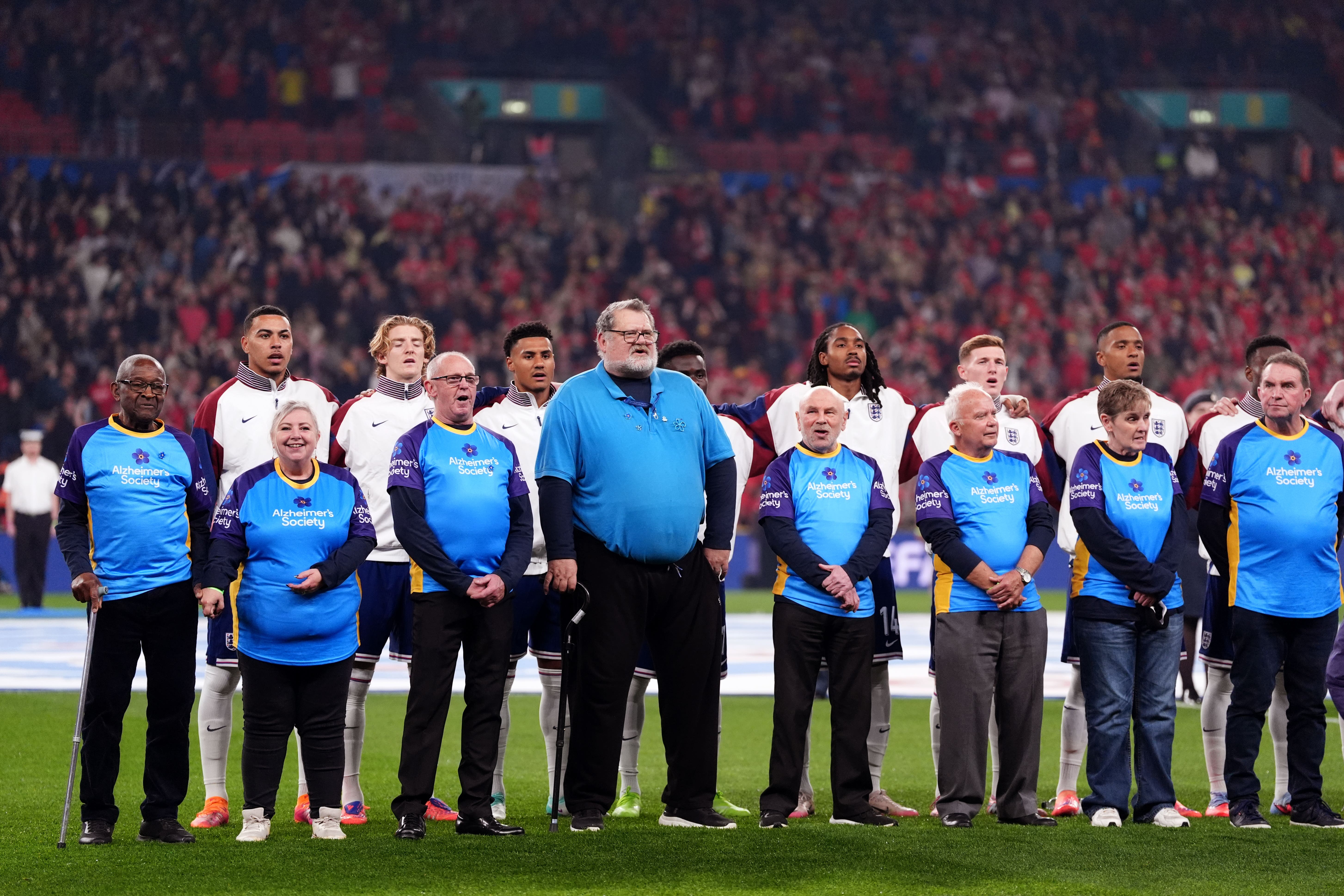 Fans suffering from dementia walked out with the players at Wembley (Adam Davy/PA)