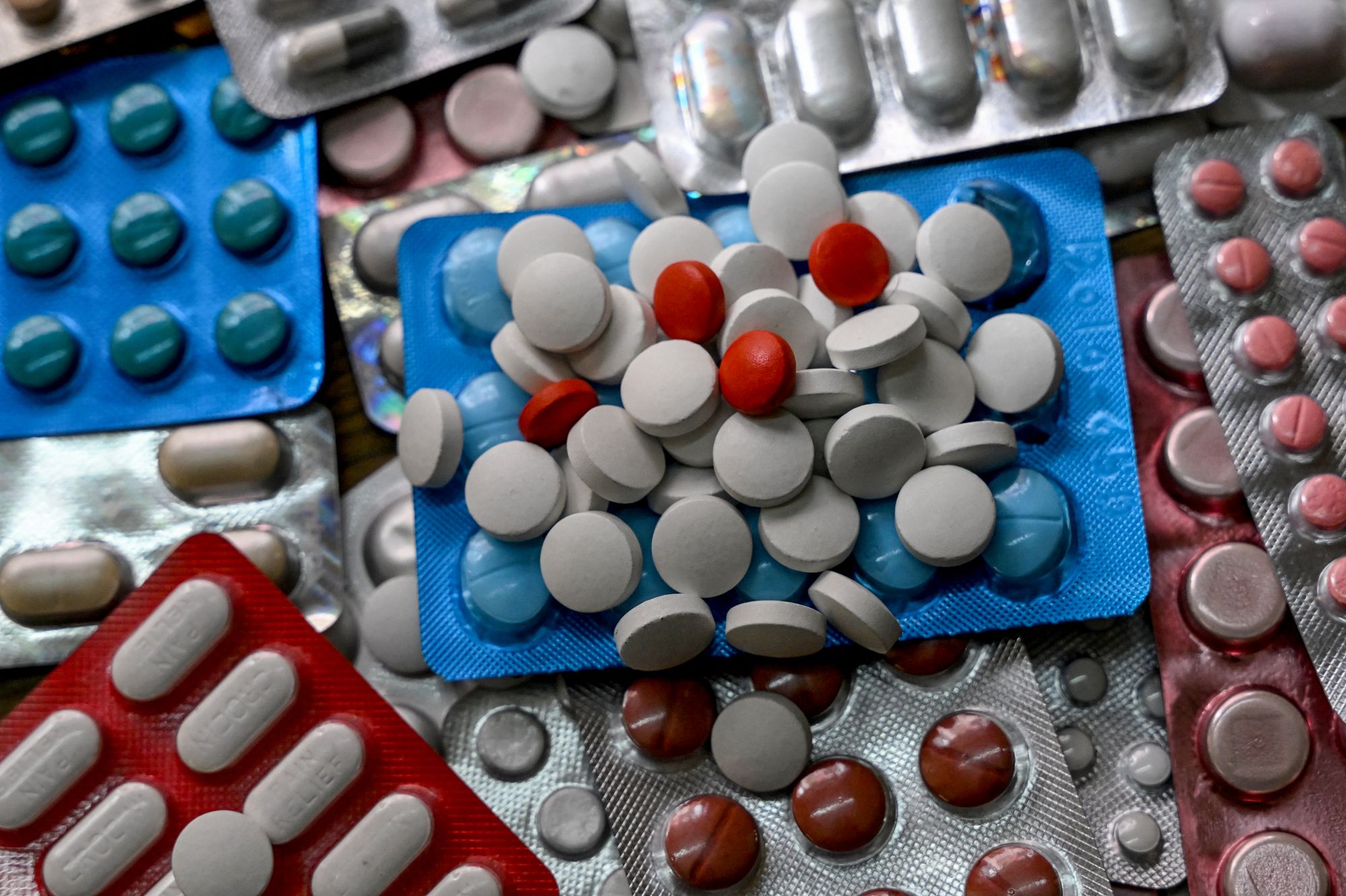 This photo illustration shows different tablets of medicines kept together, in Kolkata
