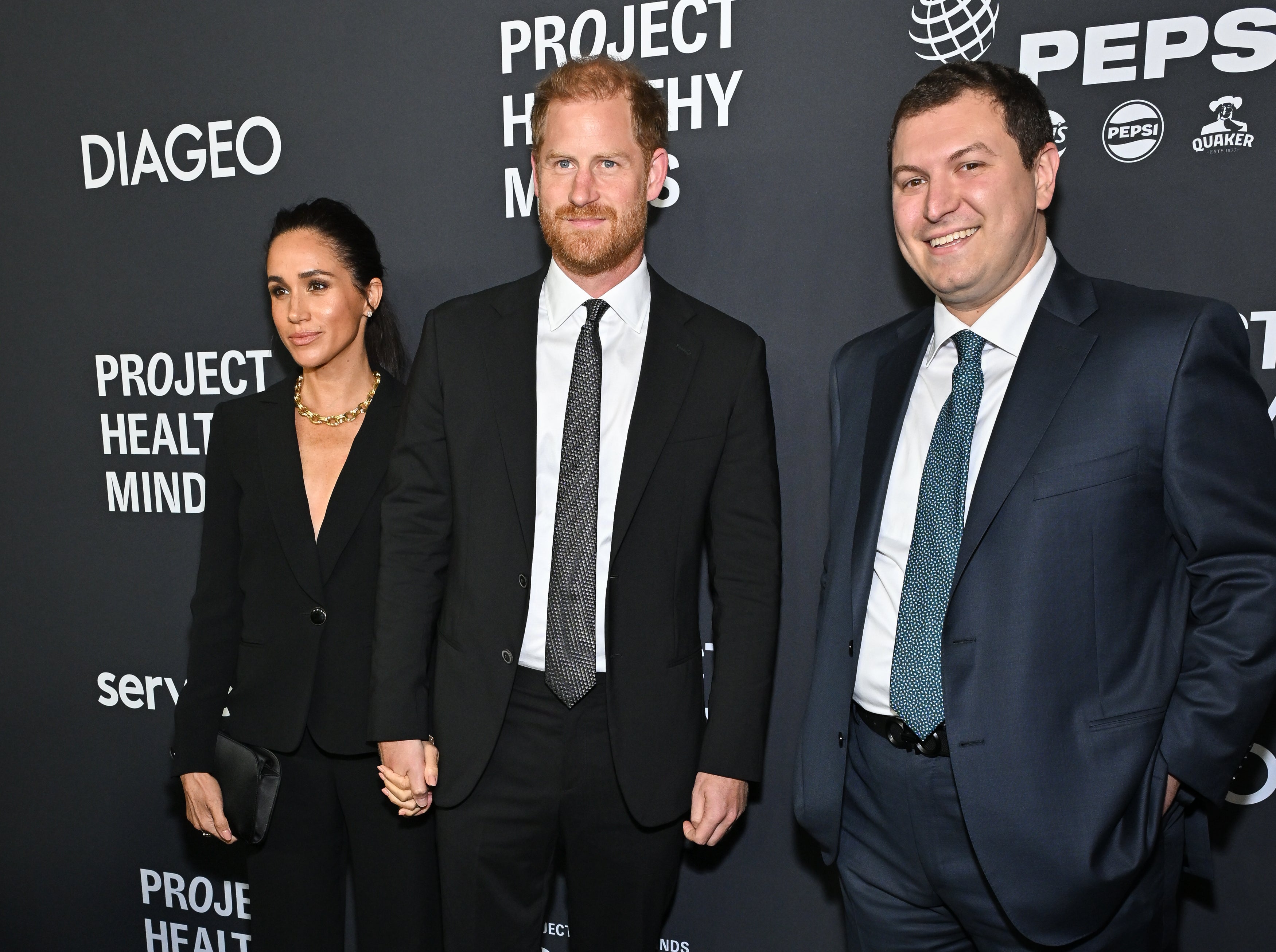 Meghan Markle and Prince with Project Healthy Minds founder and CEO Phillip Schermer