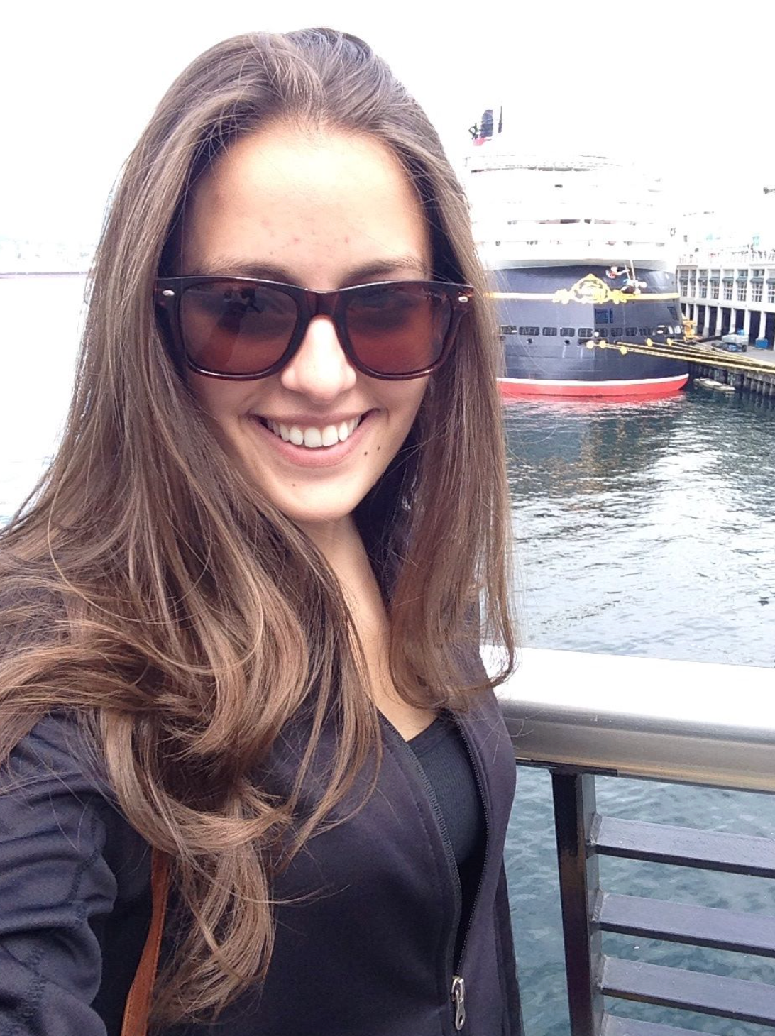Posing in front of my floating home, the Disney Wonder, while docked in Vancouver, Canada in September 2014