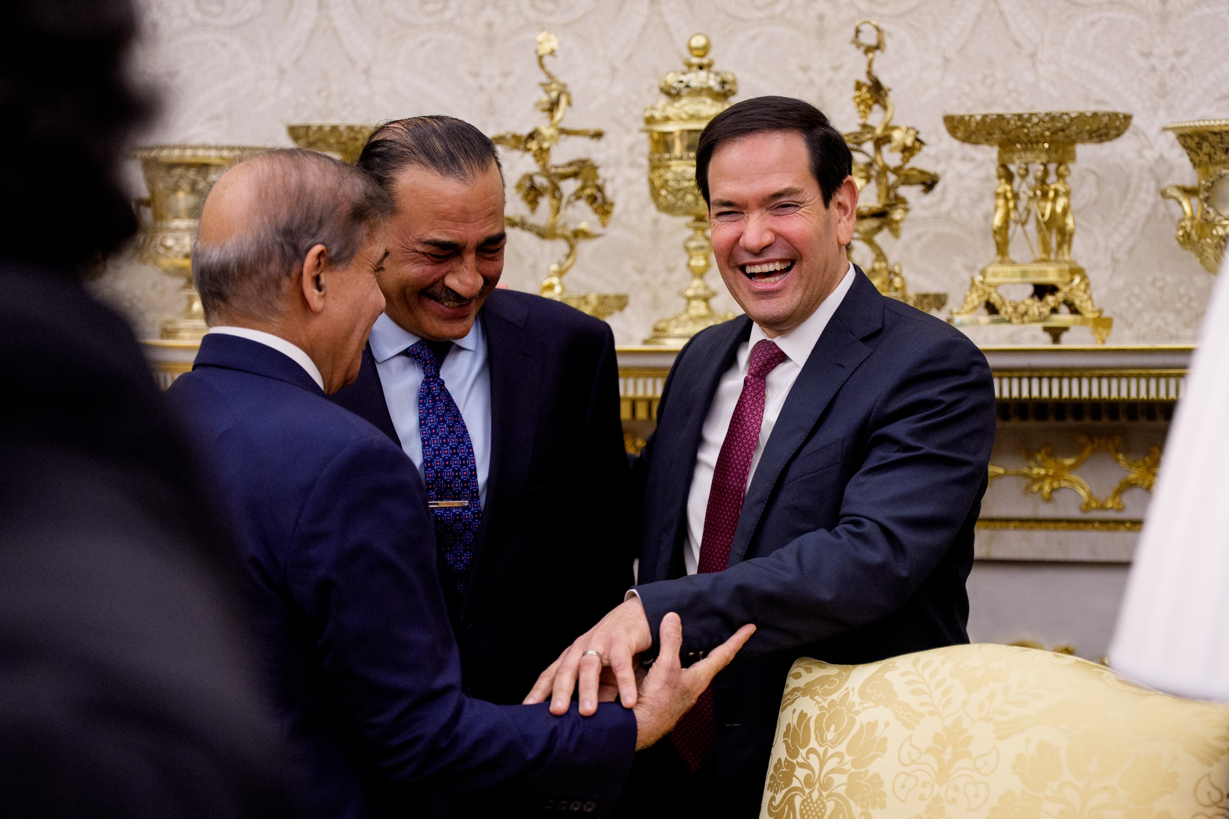 US Secretary of State Marco Rubio greets Pakistani prime minister Shehbaz Sharif as president Donald Trump speaks to reporters at the White House