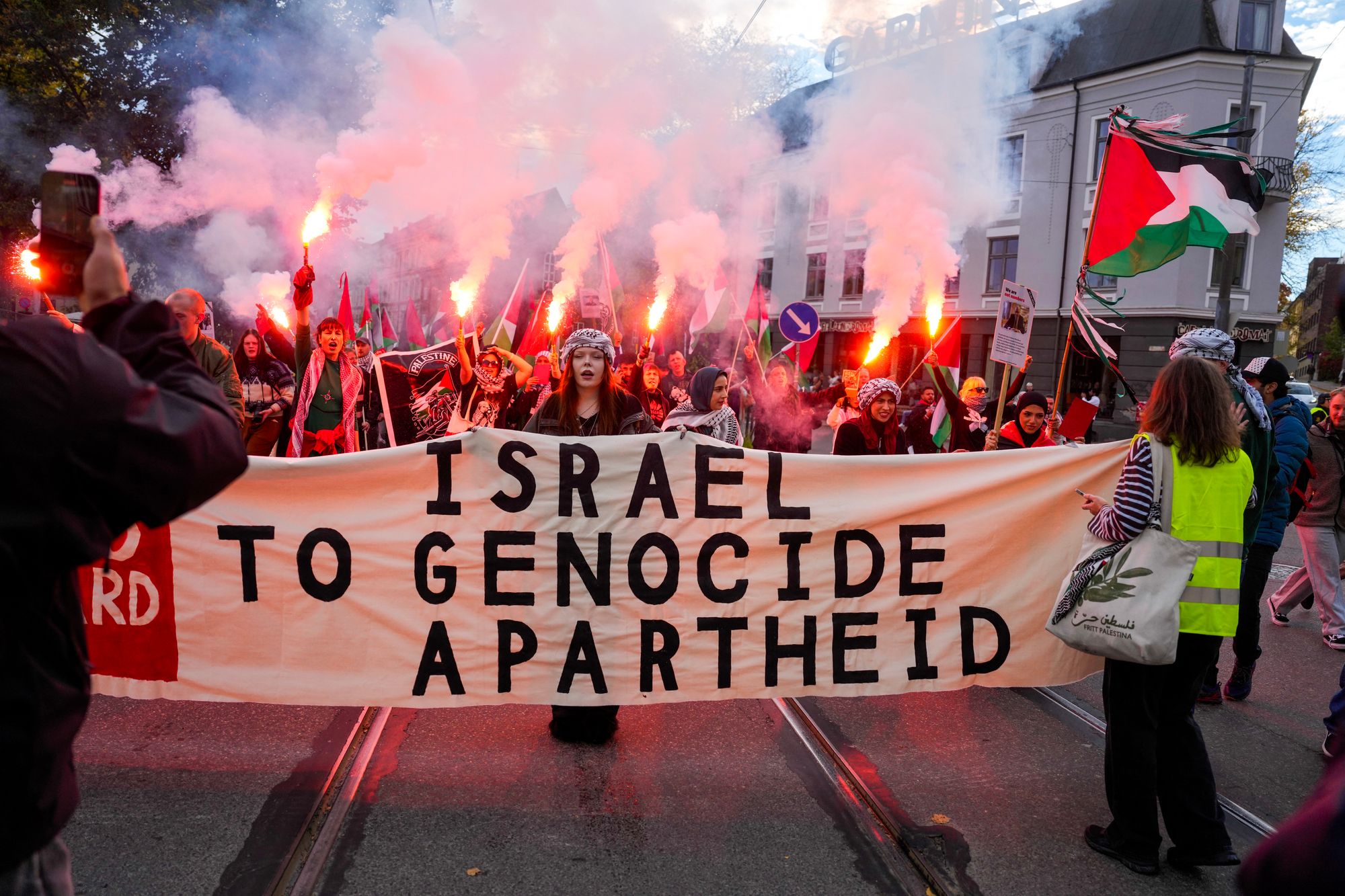 Protesters march in Oslo ahead of Norway's football match with Israel