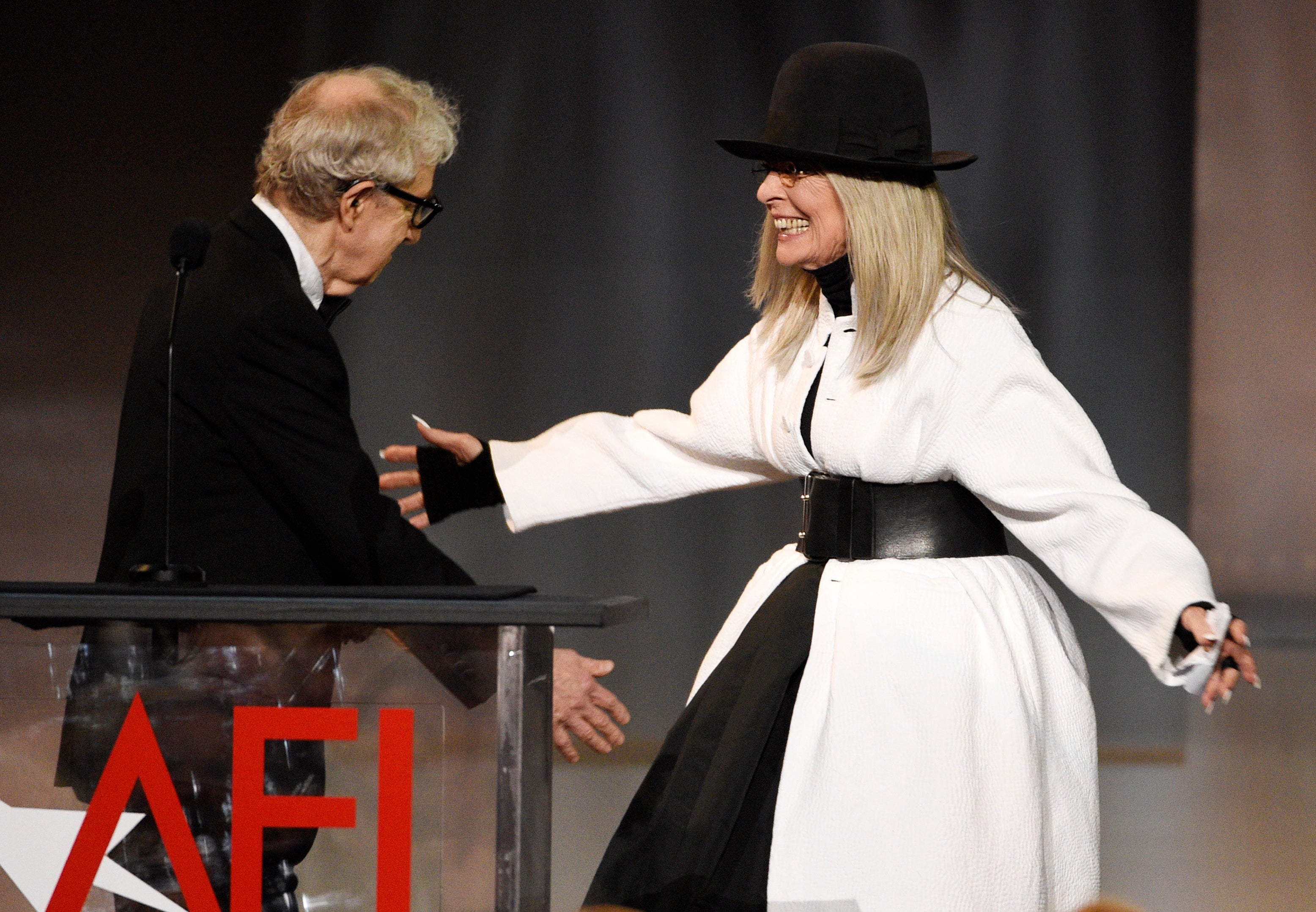 Woody Allen, left, greets actress Diane Keaton onstage to present her with the 45th AFI Life Achievement Award on June 8, 2017