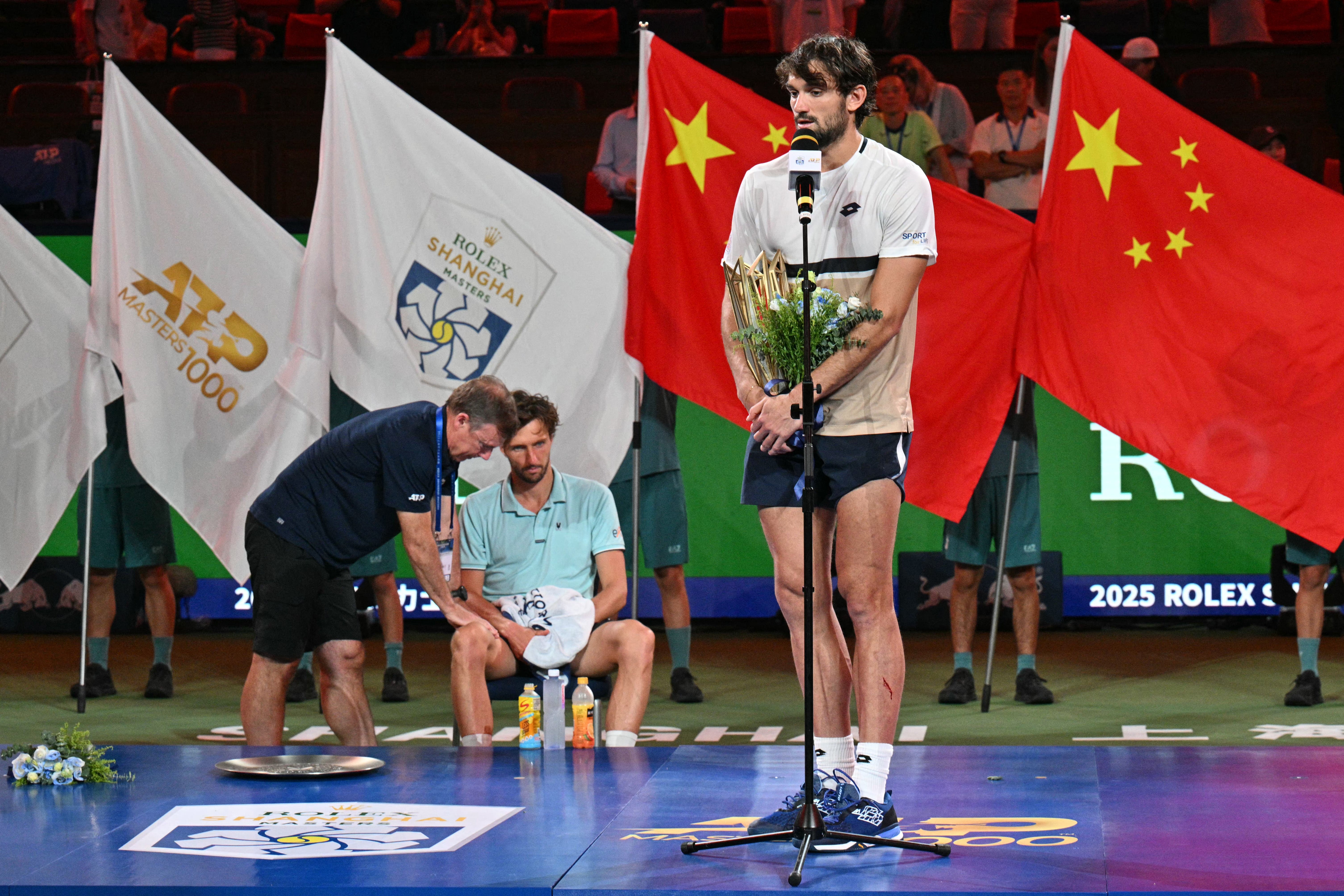 Rinderknech cramped up and had to receive treatment during the trophy ceremony