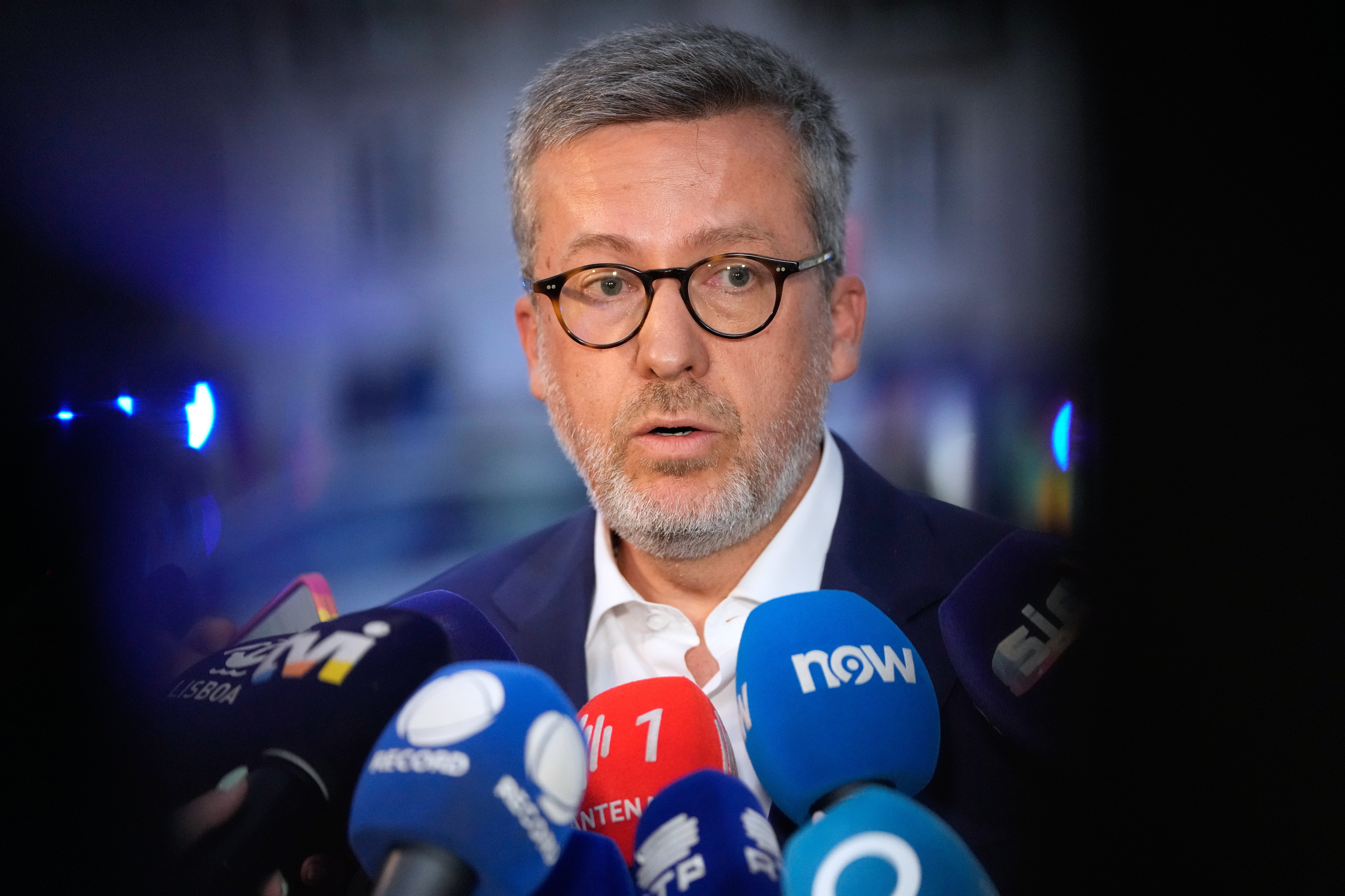 Lisbon Mayor Carlos Moedas speaks to journalists at the site of a derailed electric streetcar in downtown Lisbon, Wednesday, Sept. 3, 2025. (AP Photo/Armando Franca)