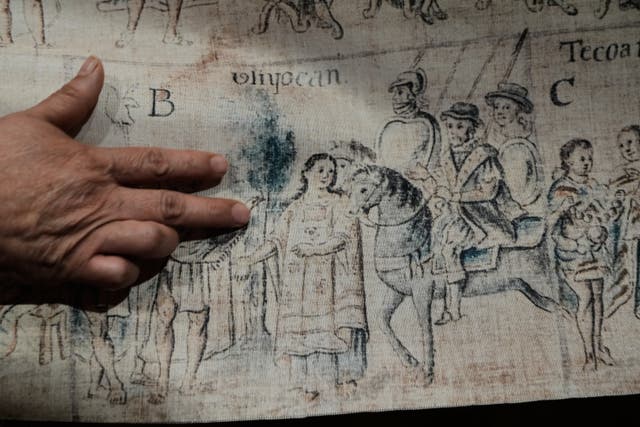 <p>Depictions on fabric of La Malinche and Hernan Cortes from the 16th century Tlaxcala Codex in Mexico City</p>