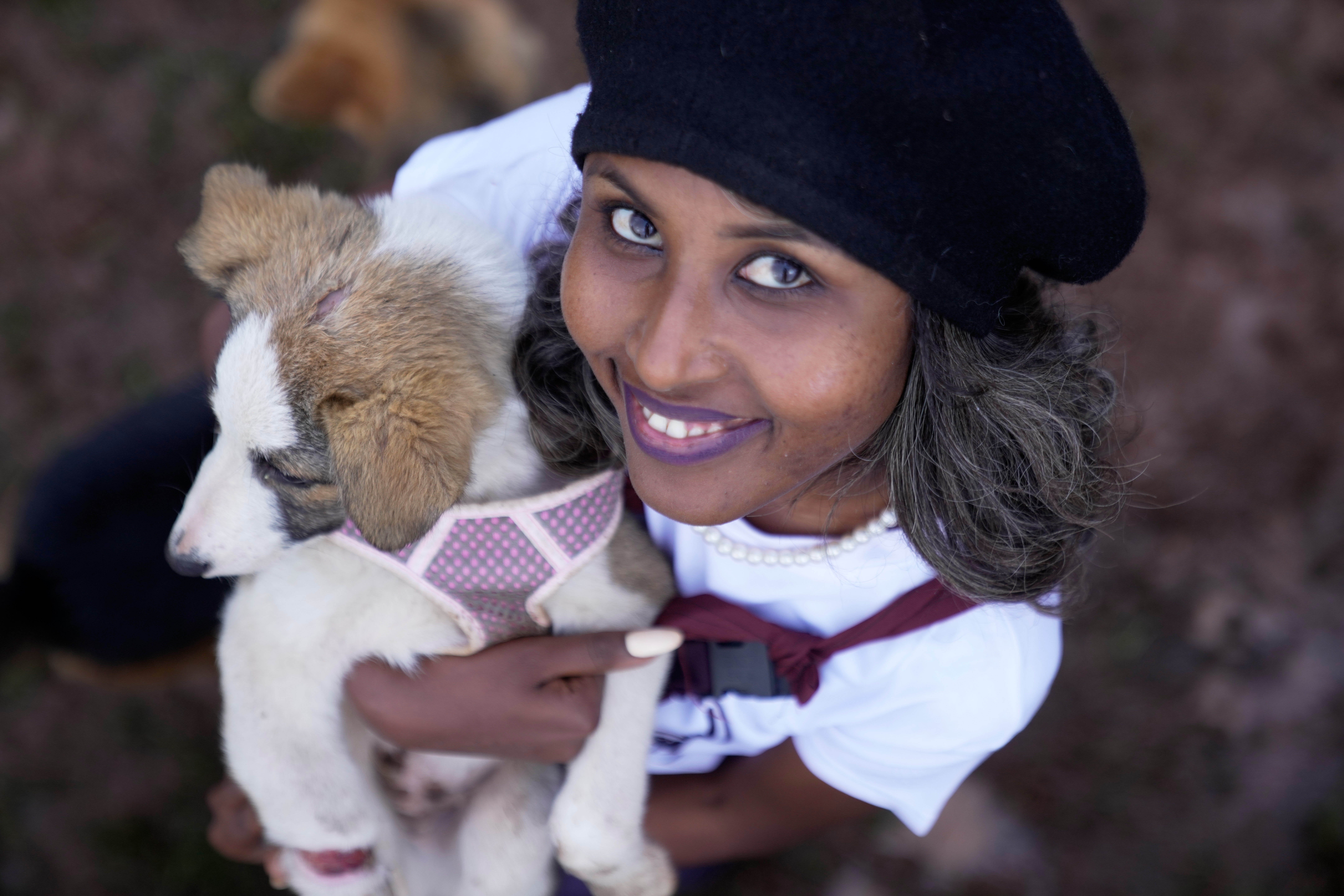 Feven Melesein, 29, who has been rescuing and feeding hundreds of stray dogs in Addis Ababa, Ethiopia