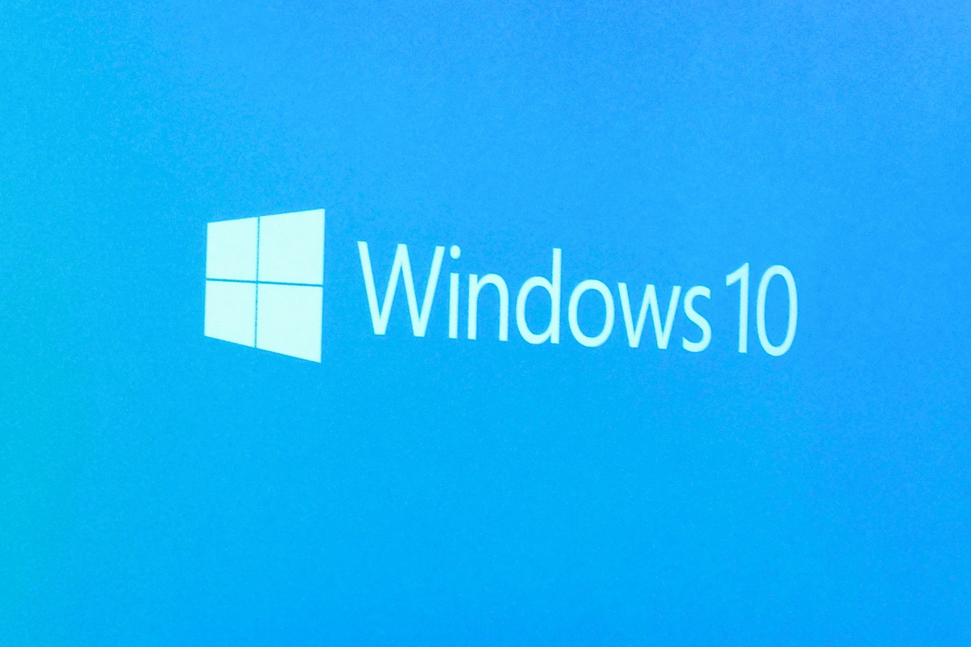 A screen showing the Windows 10 logo at a press event at Microsoft's campus in Washington on 21 January, 2015