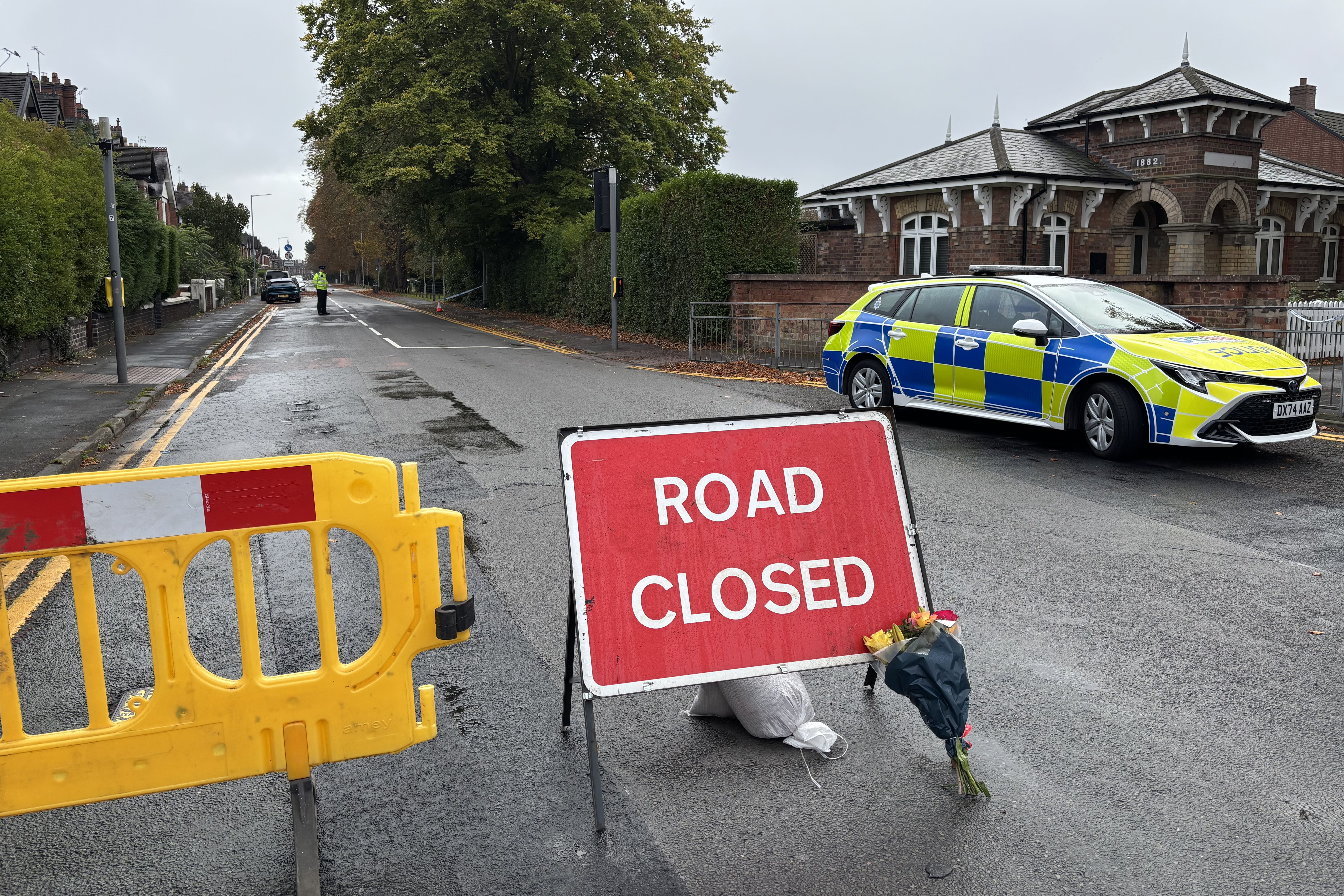 Floral tribute at the scene on Corporation Street in Stafford, Staffordshire, after a woman was arrested on suspicion of murder after the deaths of two children. (Stephanie Wareham/PA)