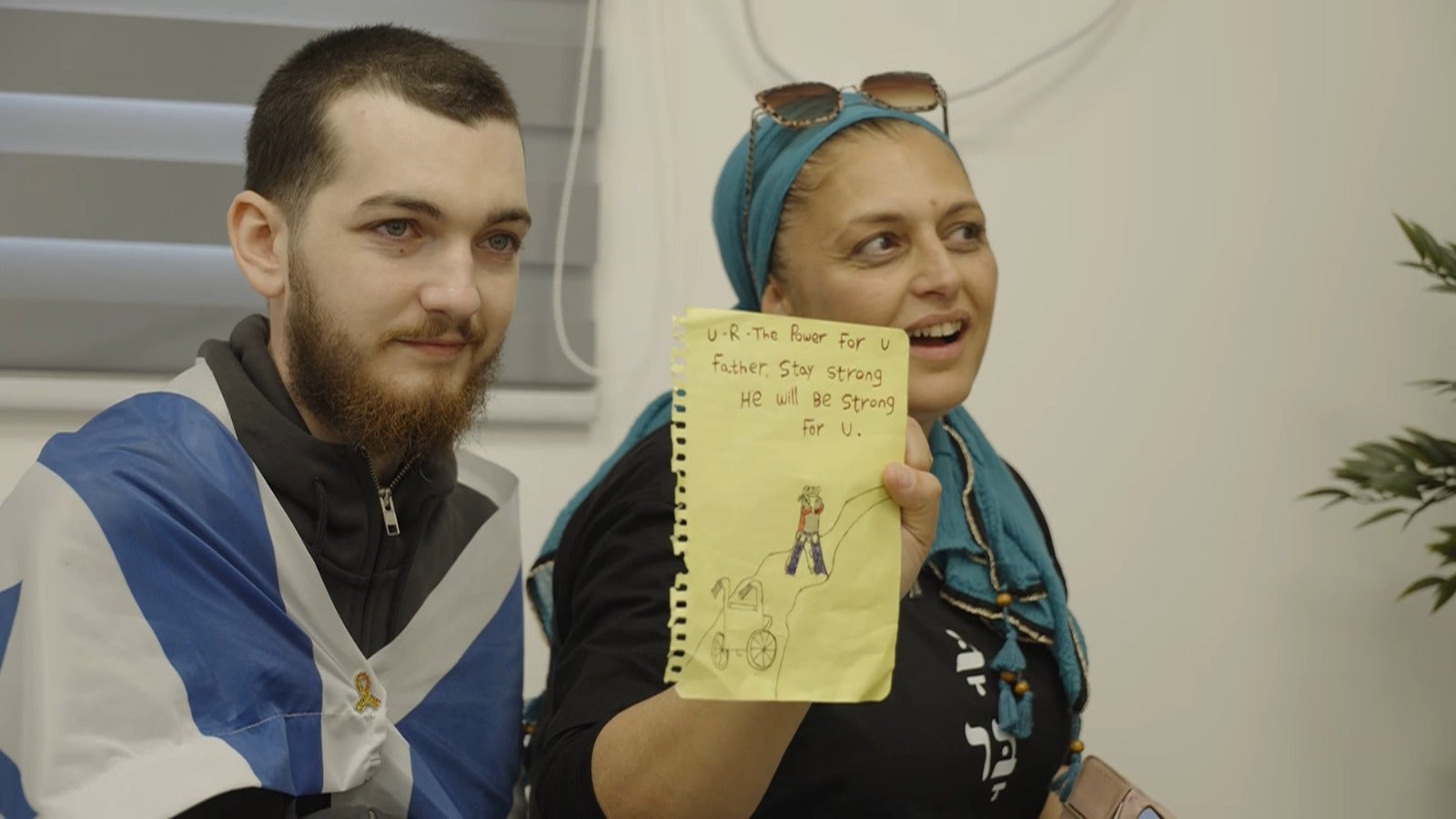 Bar Kupershtein, left, is met by loved ones after his release on Monday. He was working as a medic at the Nova festival when he was taken hostage by Hamas more than two years ago
