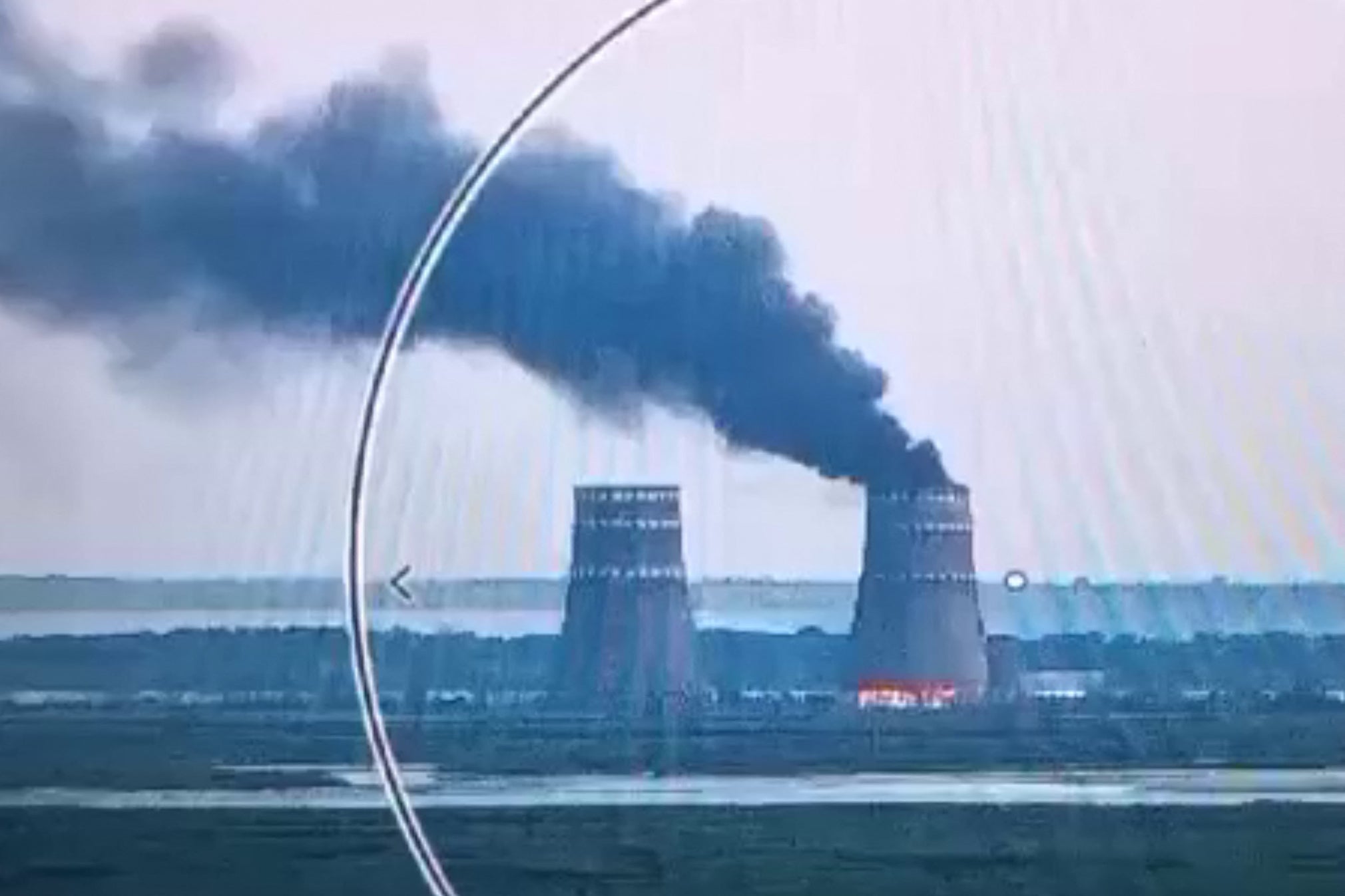 Fire at a cooling tower of the Russian-controlled Zaporizhzhia nuclear power plant in Energodar, southern Ukraine
