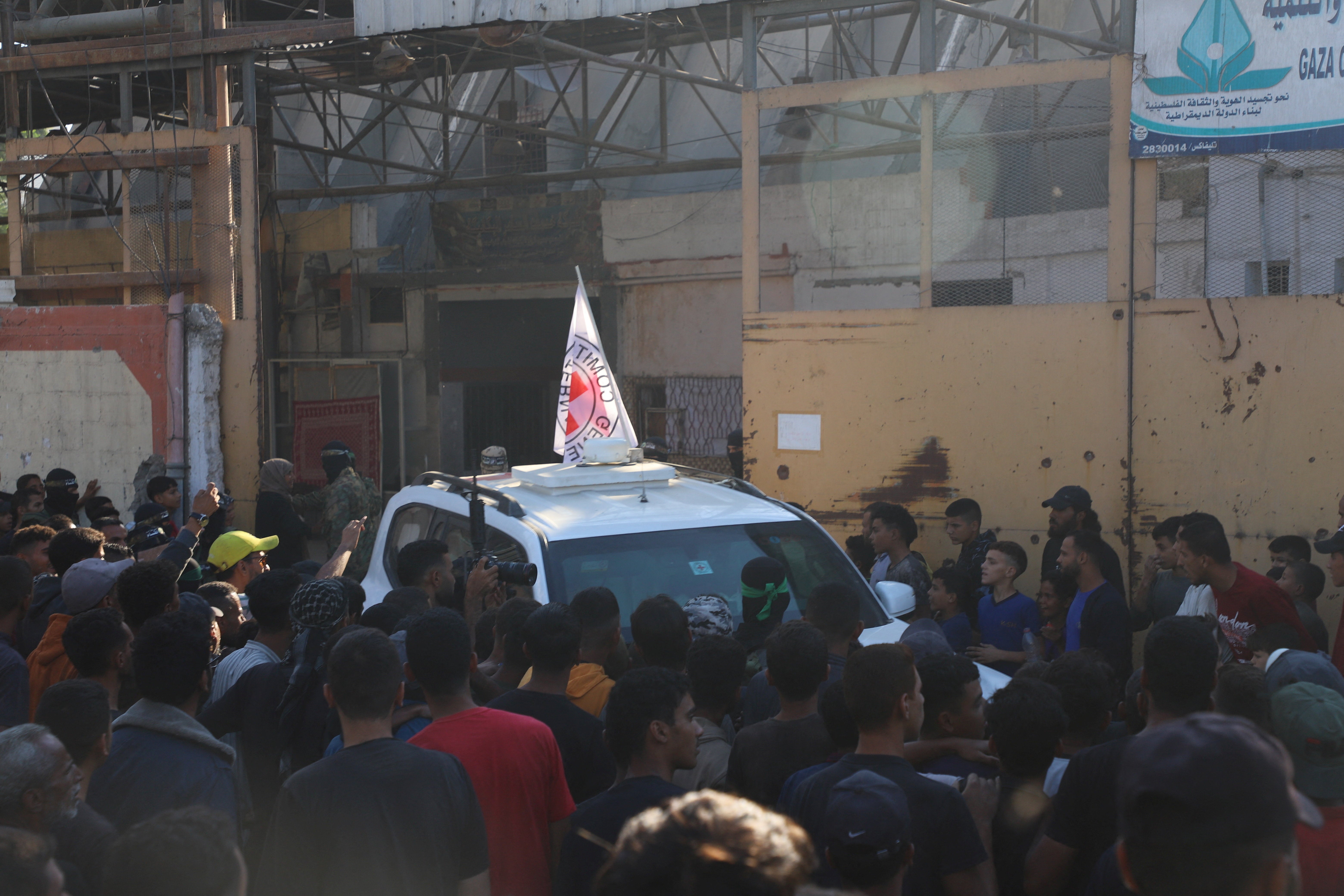 A Red Cross vehicle transports hostages, held in Gaza since the deadly October 7