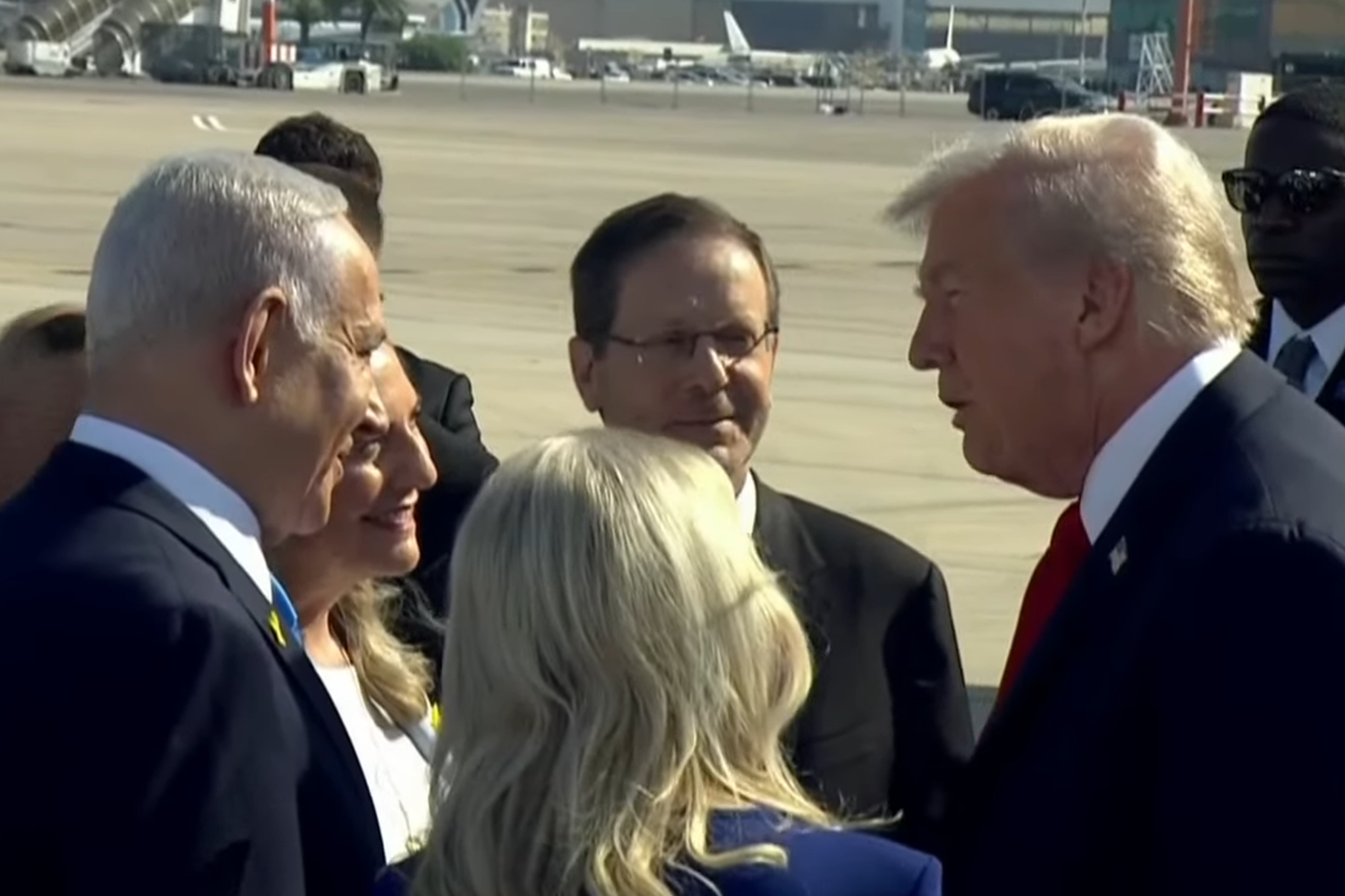 Trump meets with Netanyahu and Herzog after stepping off the plane